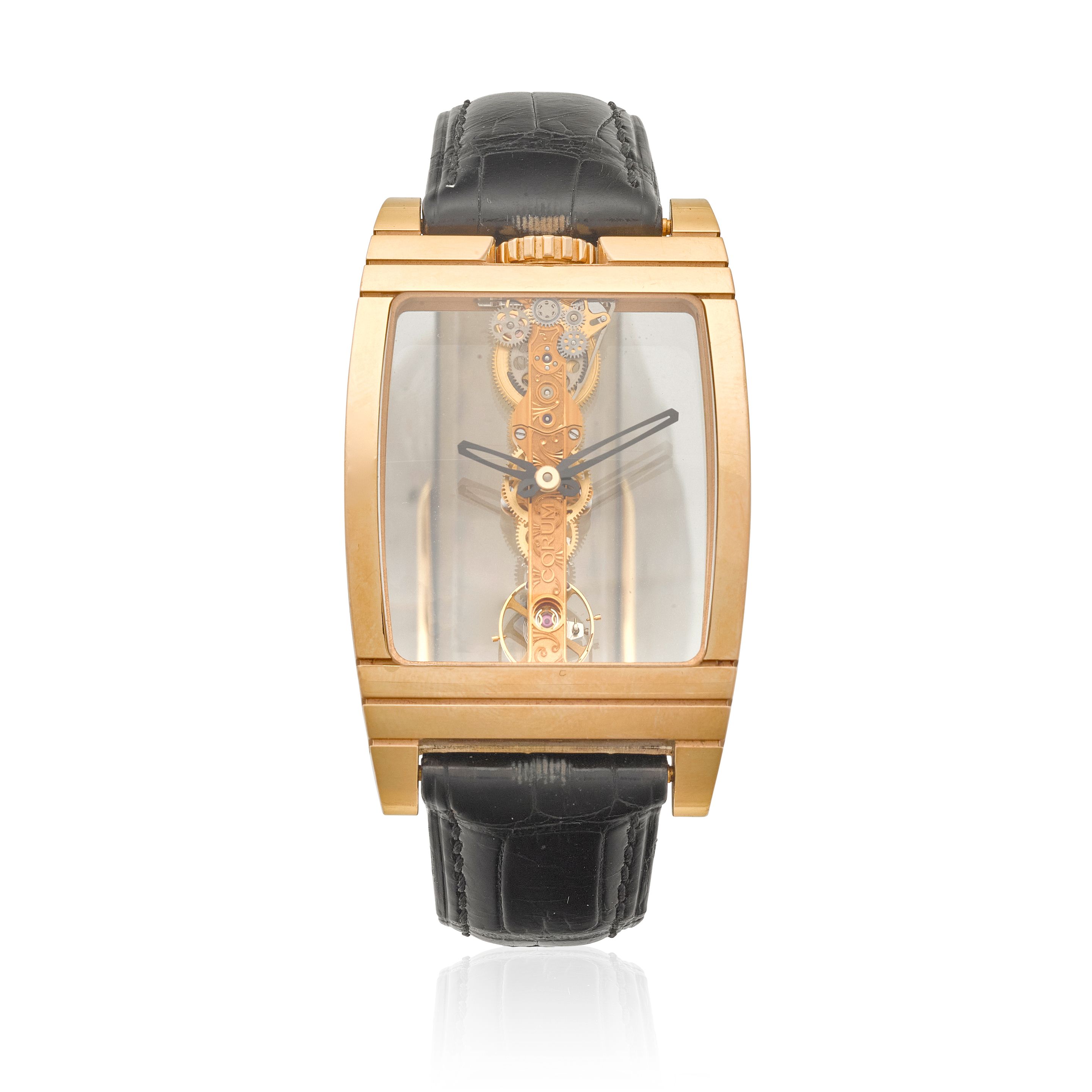 CORUM. AN 18K GOLD MANUAL WIND WRISTWATCH WITH VISIBLE STRAIGHT LINE MOVEMENT Golden Bridge, Ref: 113.550.55, c.2000s