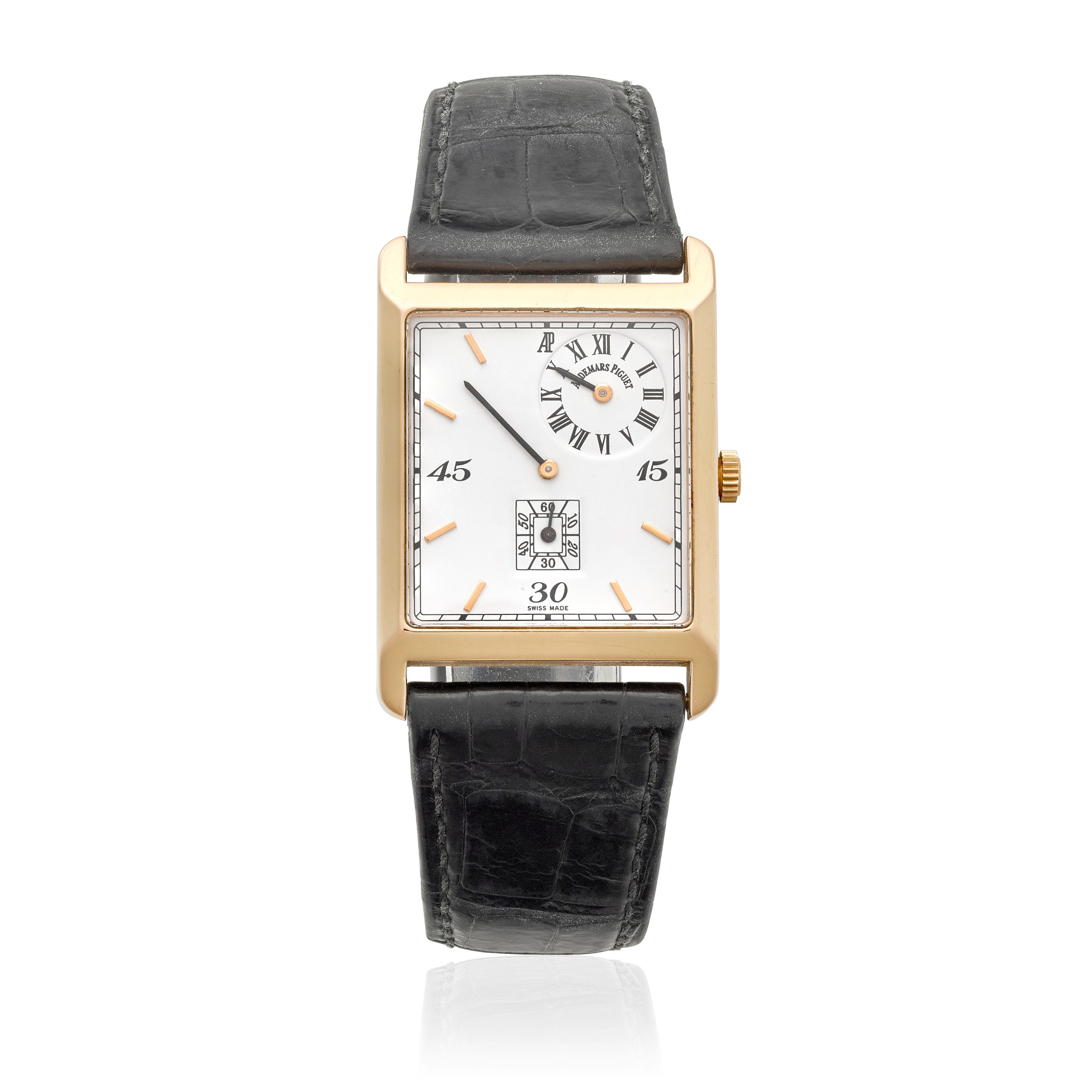AUDEMARS PIGUET. AN 18K GOLD MANUWAL WIND REGULATOR WRISTWATCH Museum Collection, c.1990s