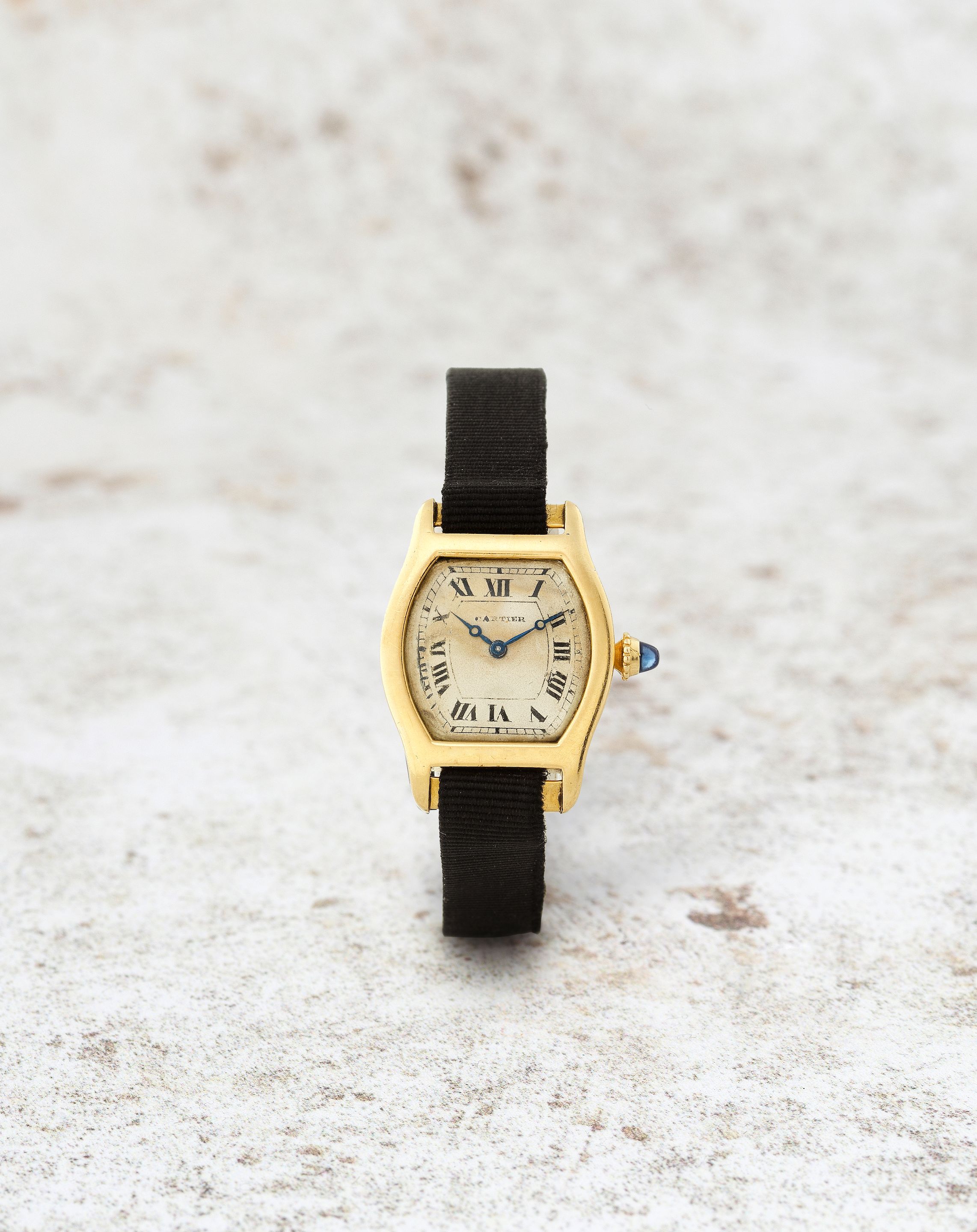 Cartier. A rare and early lady's 18K gold manual wind tonneau form wristwatch Tortue, Ref: 3457, London Import Mark for 1923