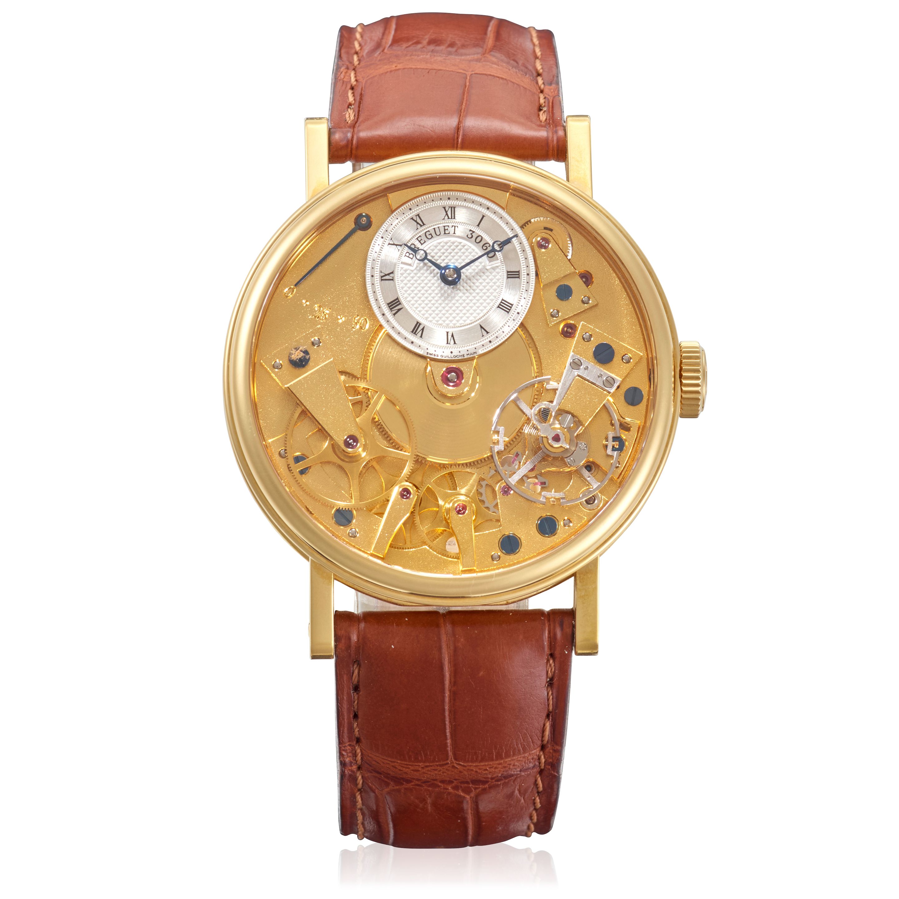 BREGUET. AN 18K GOLD MANUAL WIND SKELETONIZED WRISTWATCH WITH POWER RESERVE INDICATION La Tradition, Ref: 7207, Purchased 21st November, 2006