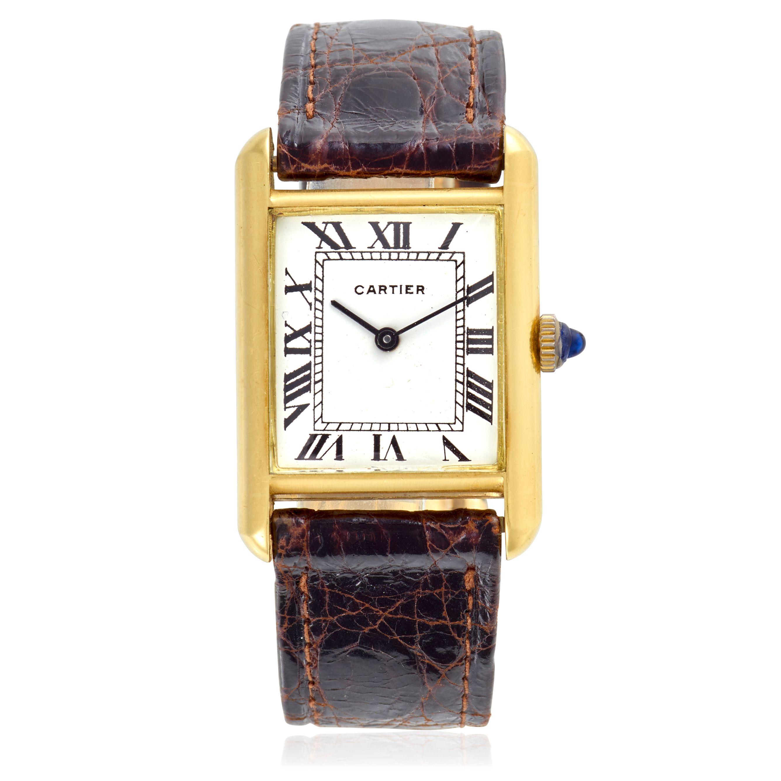 CARTIER. AN 18K YELLOW GOLD MANUAL WIND WRISTWATCH Tank Louis, c. 1995