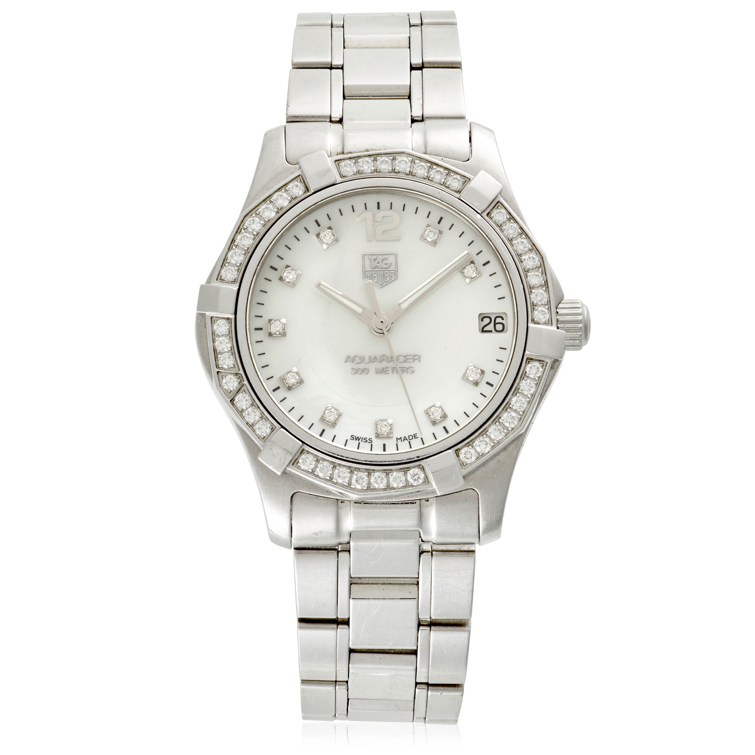 TAG HEUER. A LADYS STAINLESS STEEL AND DIAMOND SET QUARTZ CALENDAR BRACELET WATCH Aquaracer, Circa 2000