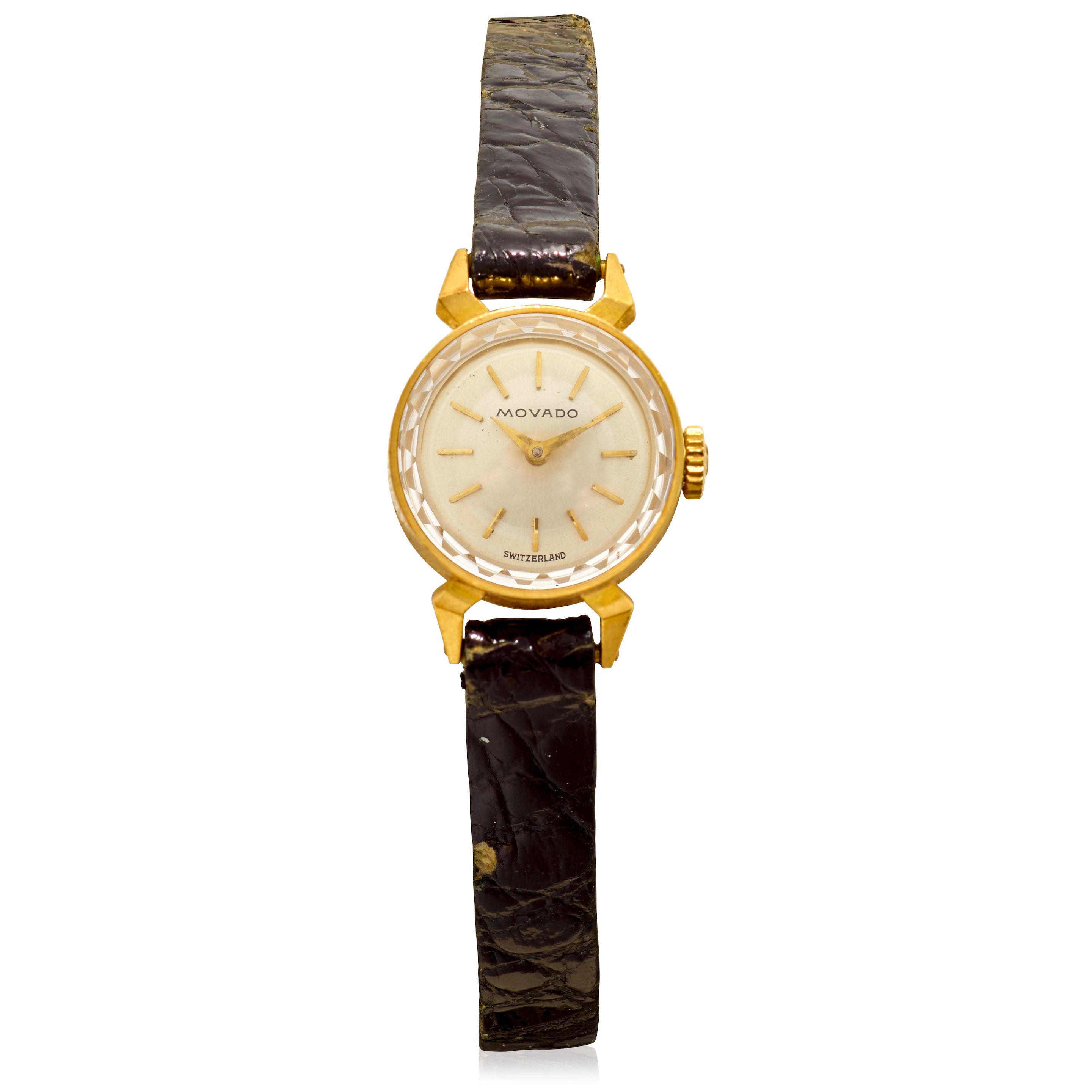 MOVADO. A LADY'S 18K GOLD MANUAL WIND WRISTWATCH WITH ANGLED LUGS Circa 1960