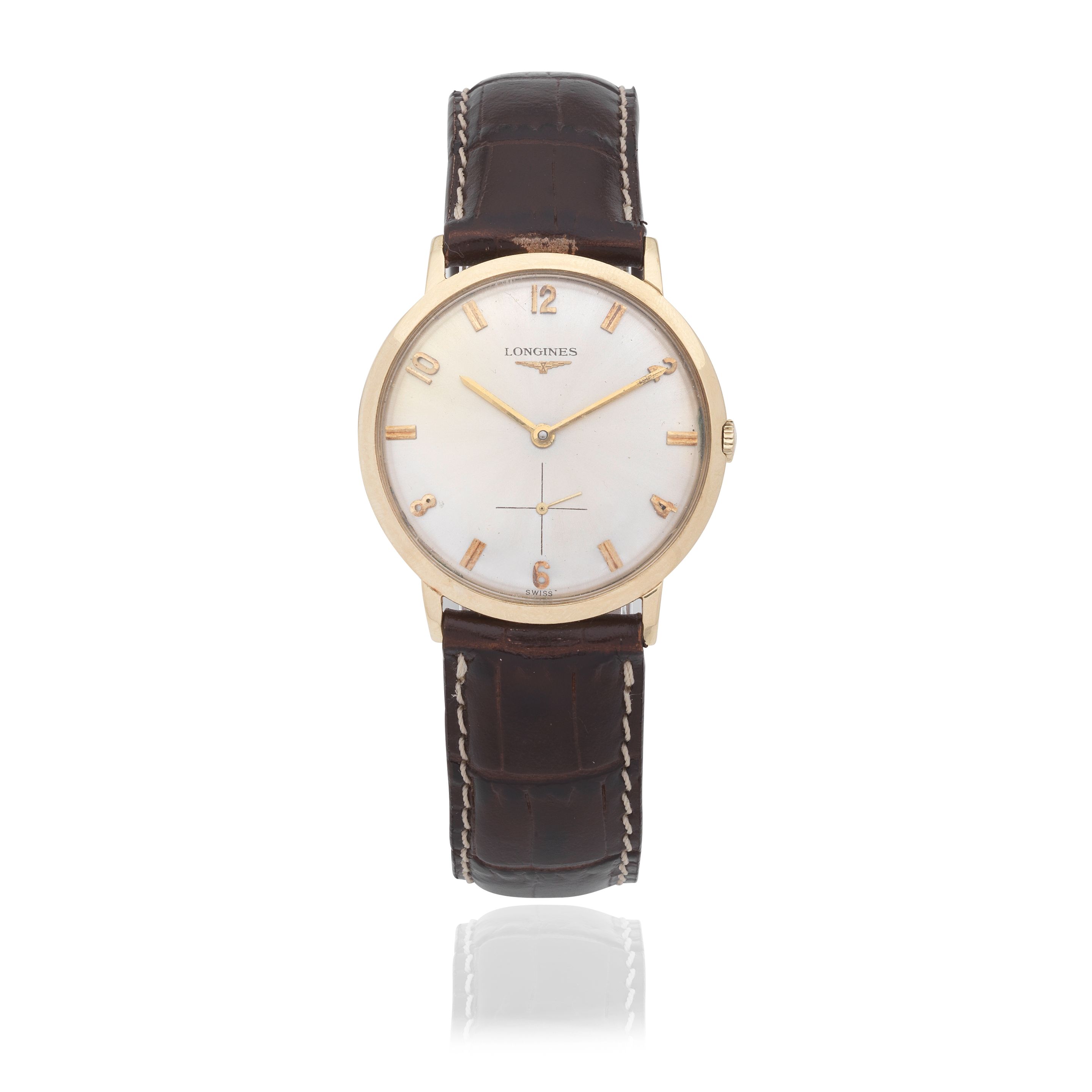 Longines. A 14K gold manual wind wristwatch Circa 1962