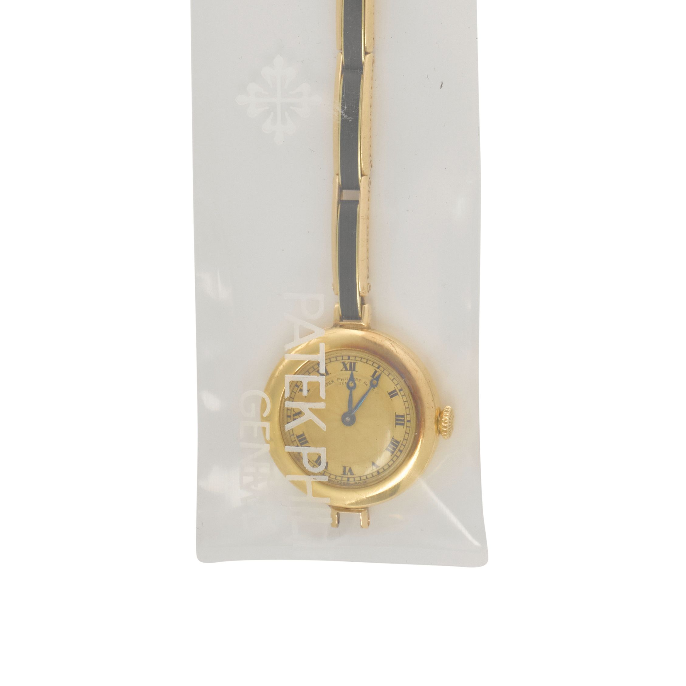 PATEK PHILIPPE. A RARE EARLY 18K GOLD MANUAL WIND WRISTWATCH AND 14K ENAMELED GOLD BRACELETCirca 1915