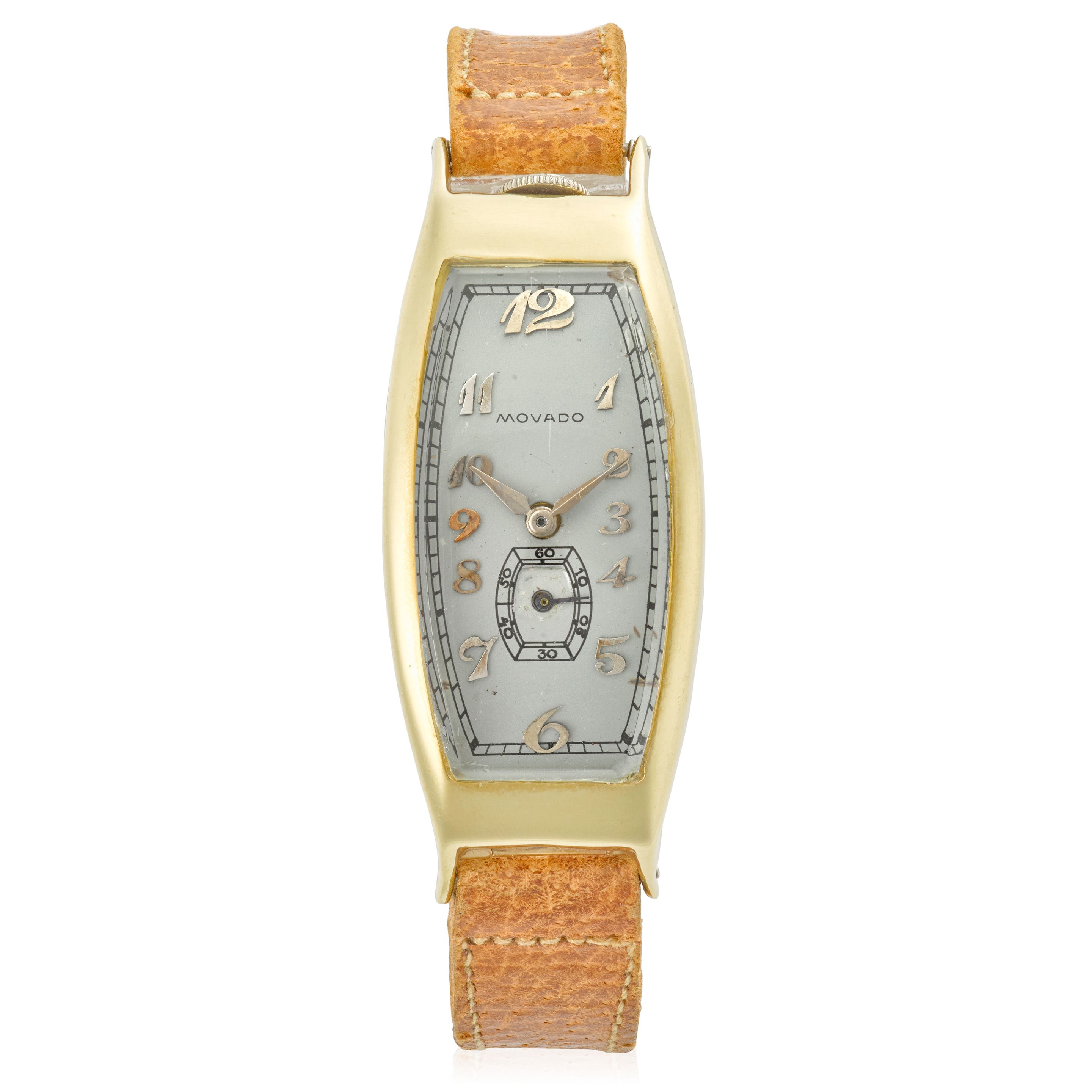 MOVADO. AN UNUSUAL 18K GOLD CURVED RECTANGULAR WRISTWATCH Polyplan, Ref: 4010, Circa 1920