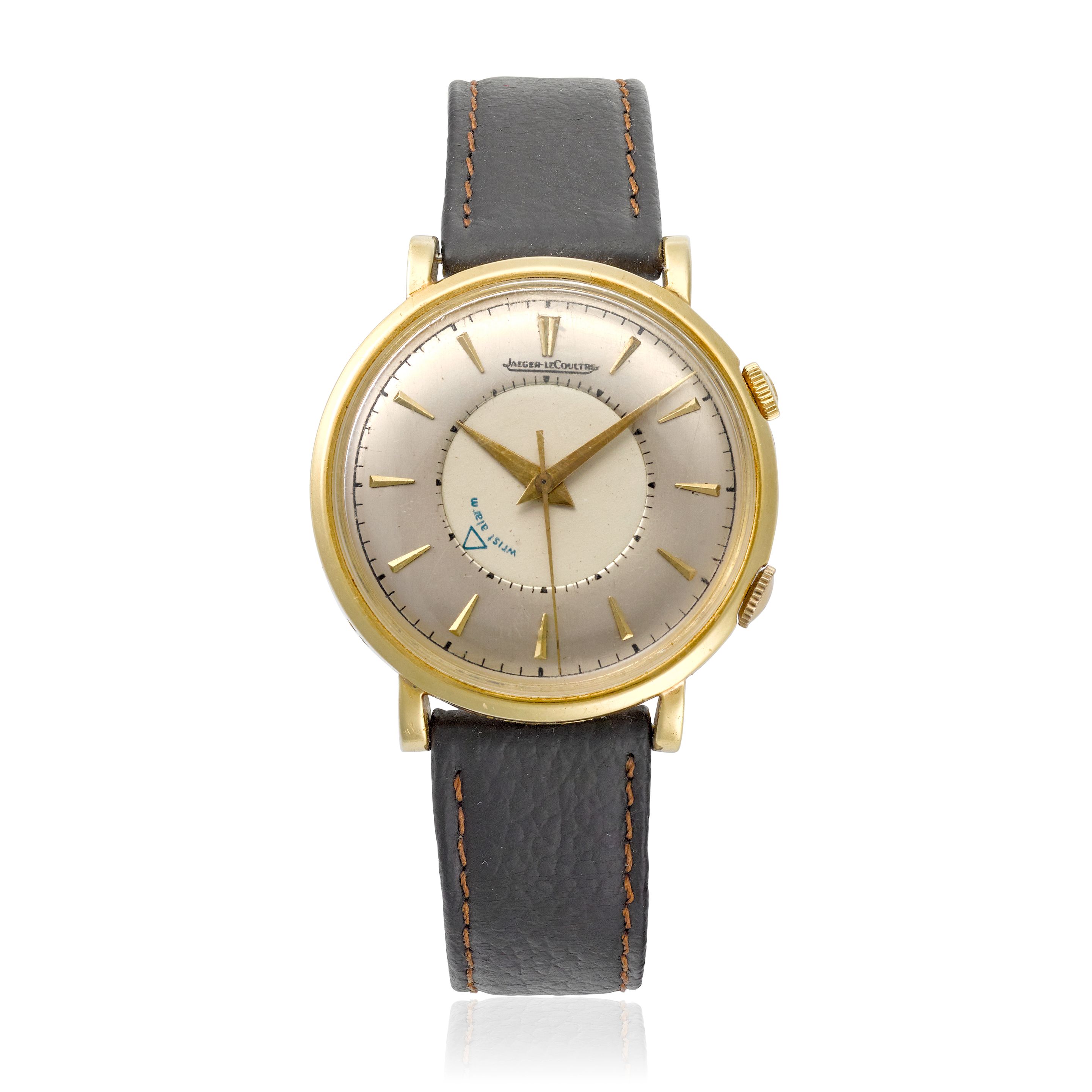 JAEGER LECOULTRE. AN 18K GOLD MANUAL WIND ALARM WRISTWATCH Memovox, c.1950s