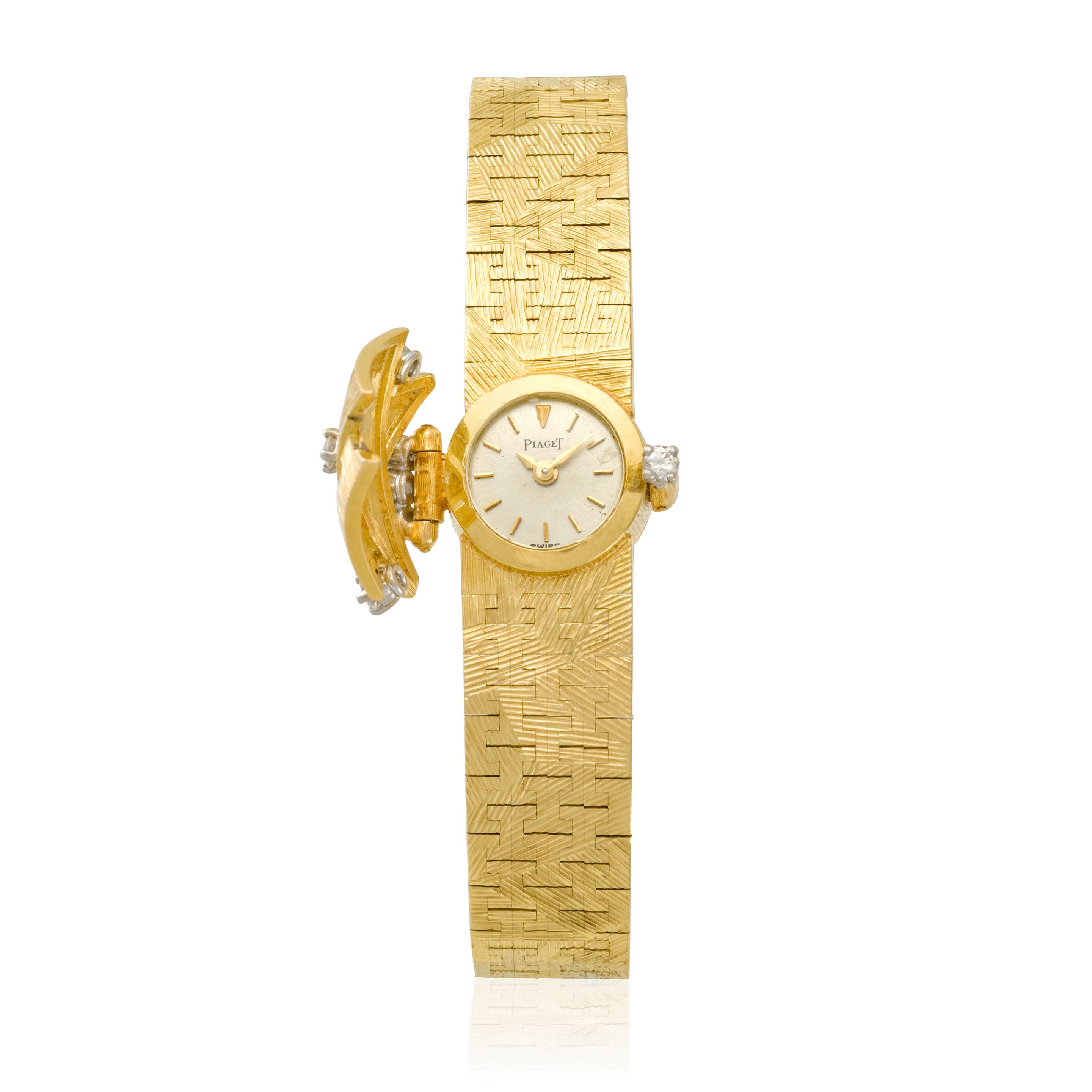 PIAGET. AN 18K GOLD AND DIAMOND MANUAL BACKWINDING BRACELET WATCH WITH CONCEALED DIALc.1950s