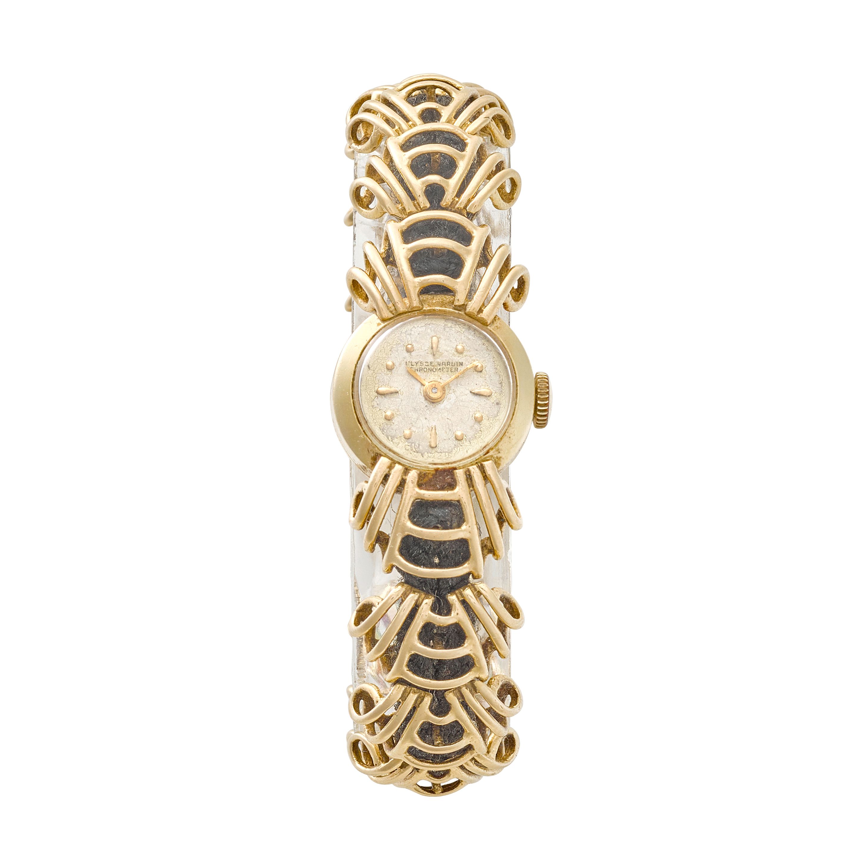 ULYSSE NARDIN. A 14K GOLD LADY'S COCKTAIL BRACELET WATCHc.1940s