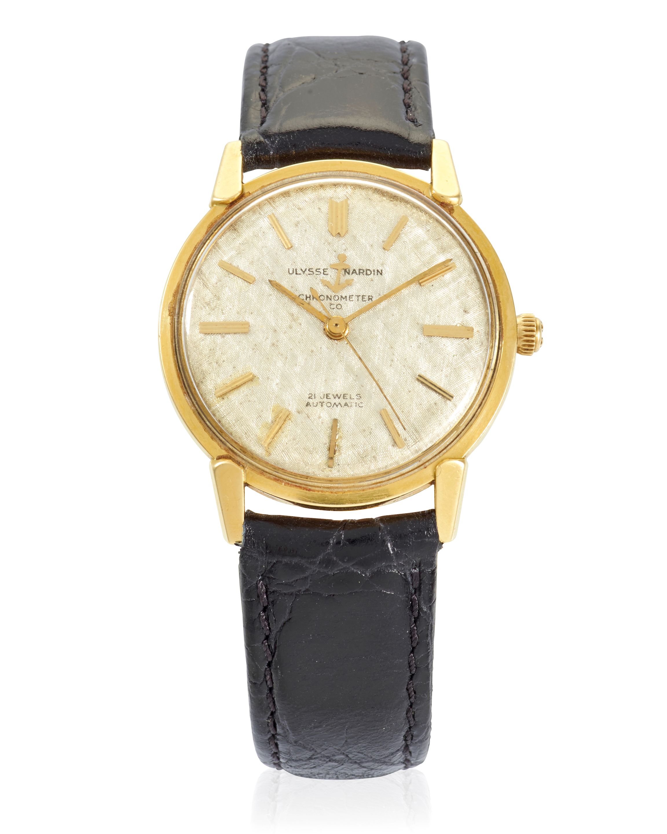 ULYSSE NARDIN. A 14K GOLD AUTOMATIC CALENDAR WRISTWATCHc. 1960s