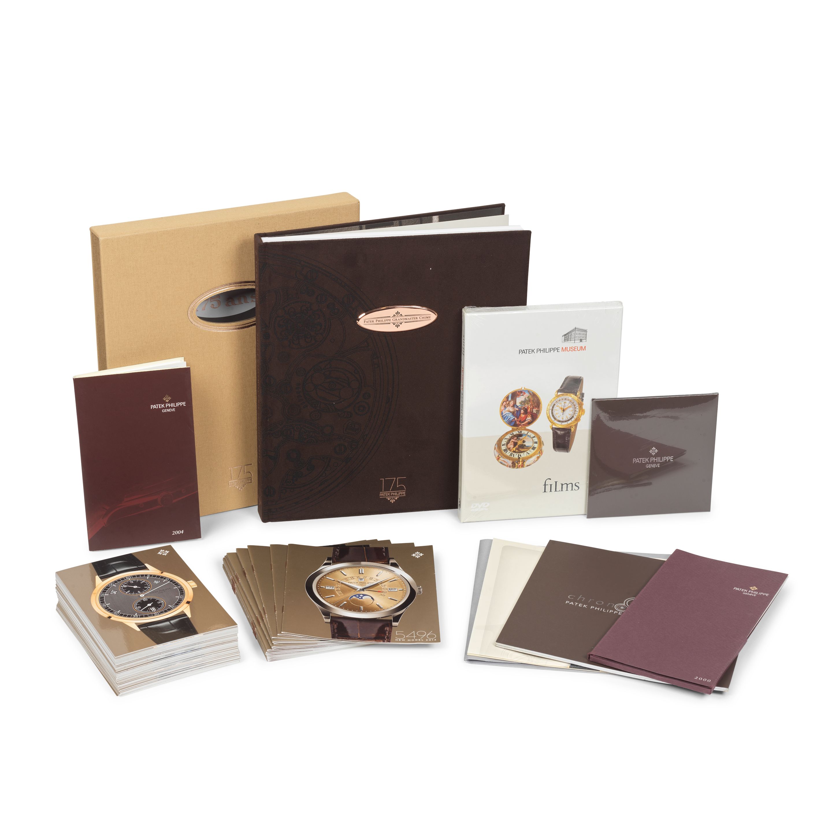 Patek Philippe. A lot of brochures along with book from the Watch Art Grand Exhibition