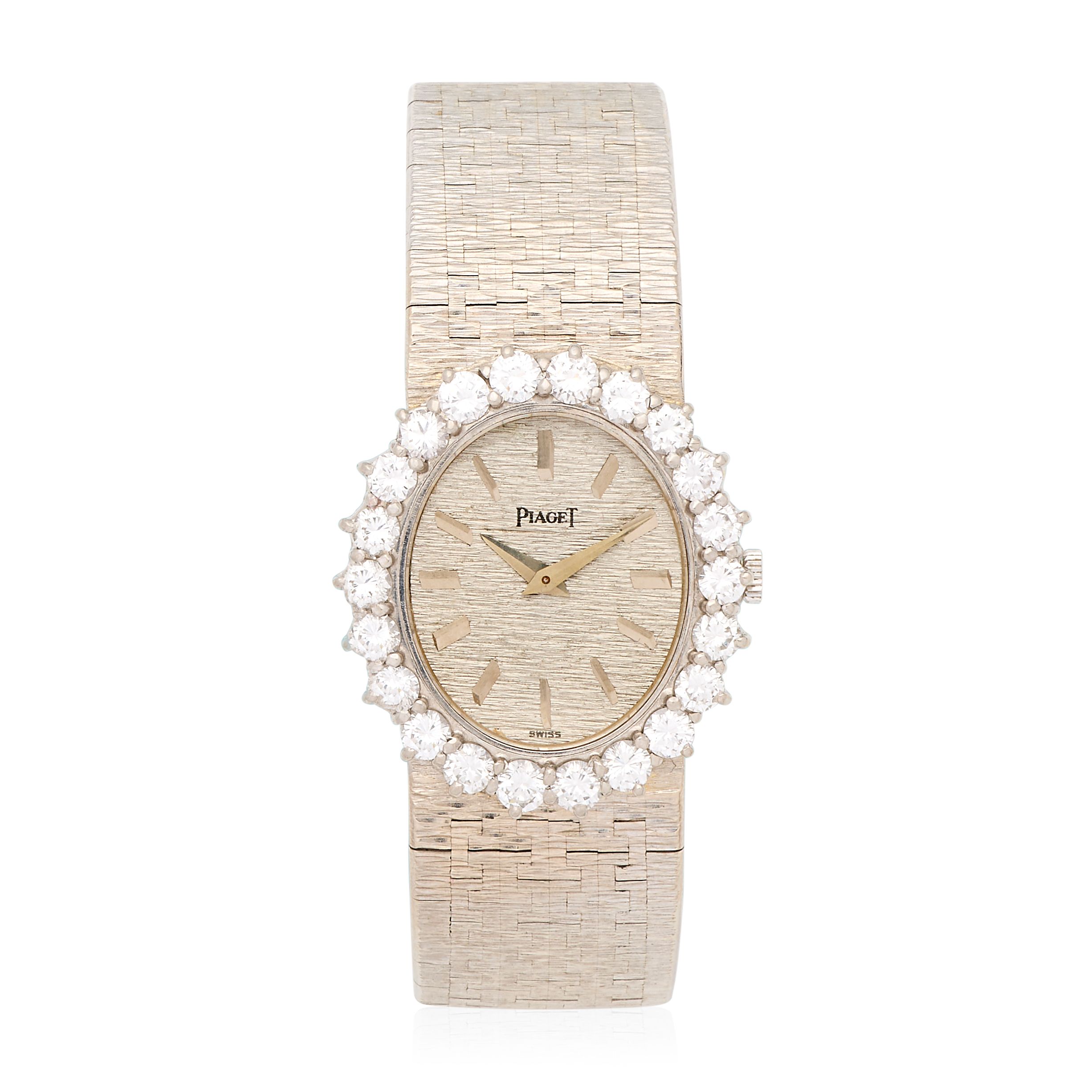 Piaget. A lady's 18K white gold diamond set manual wind bracelet watch Ref: 9338 A6, London Import mark for 1988