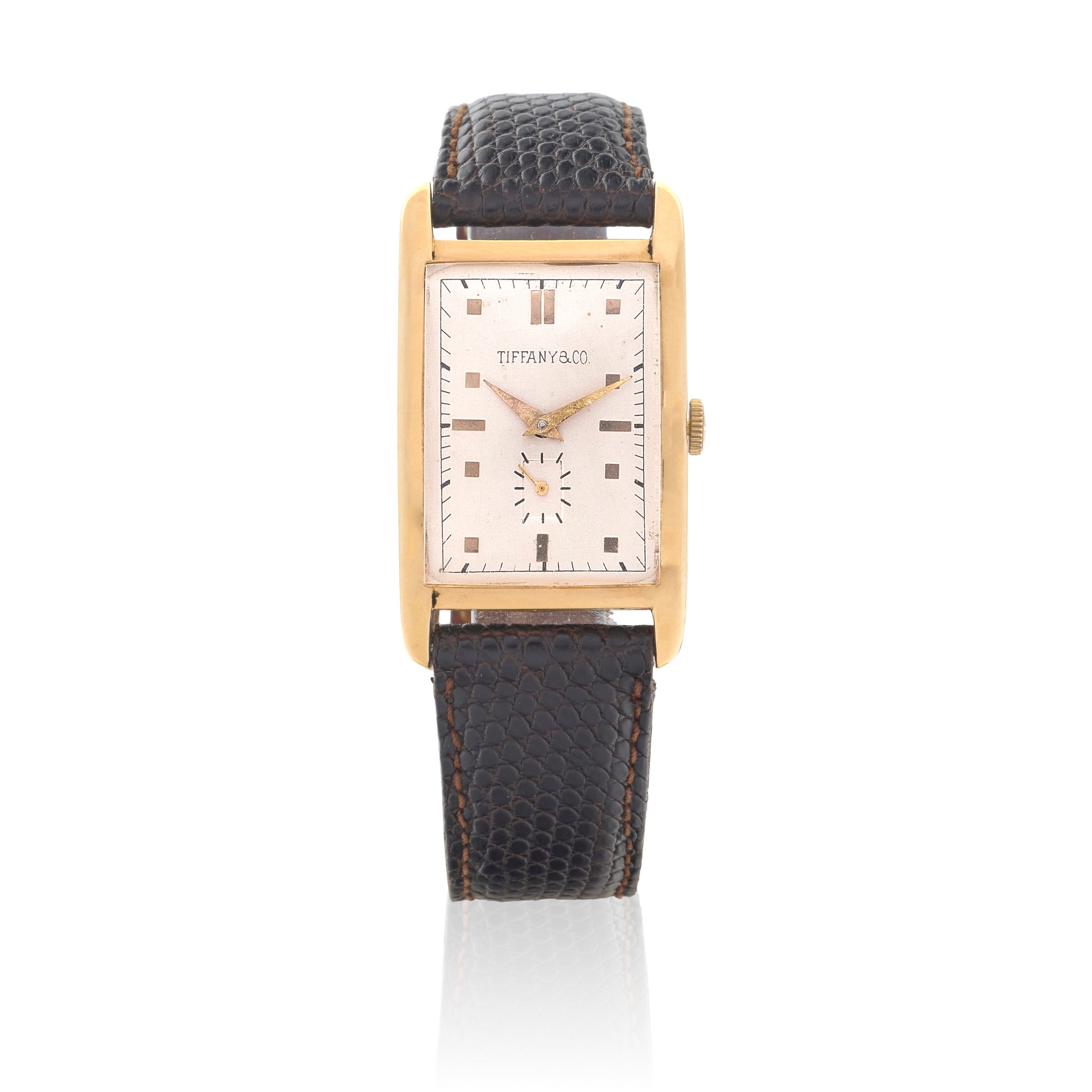 Movado. A 14K gold manual wind wristwatch Retailed by Tiffany & Co. Ref: 43900, Circa 1940