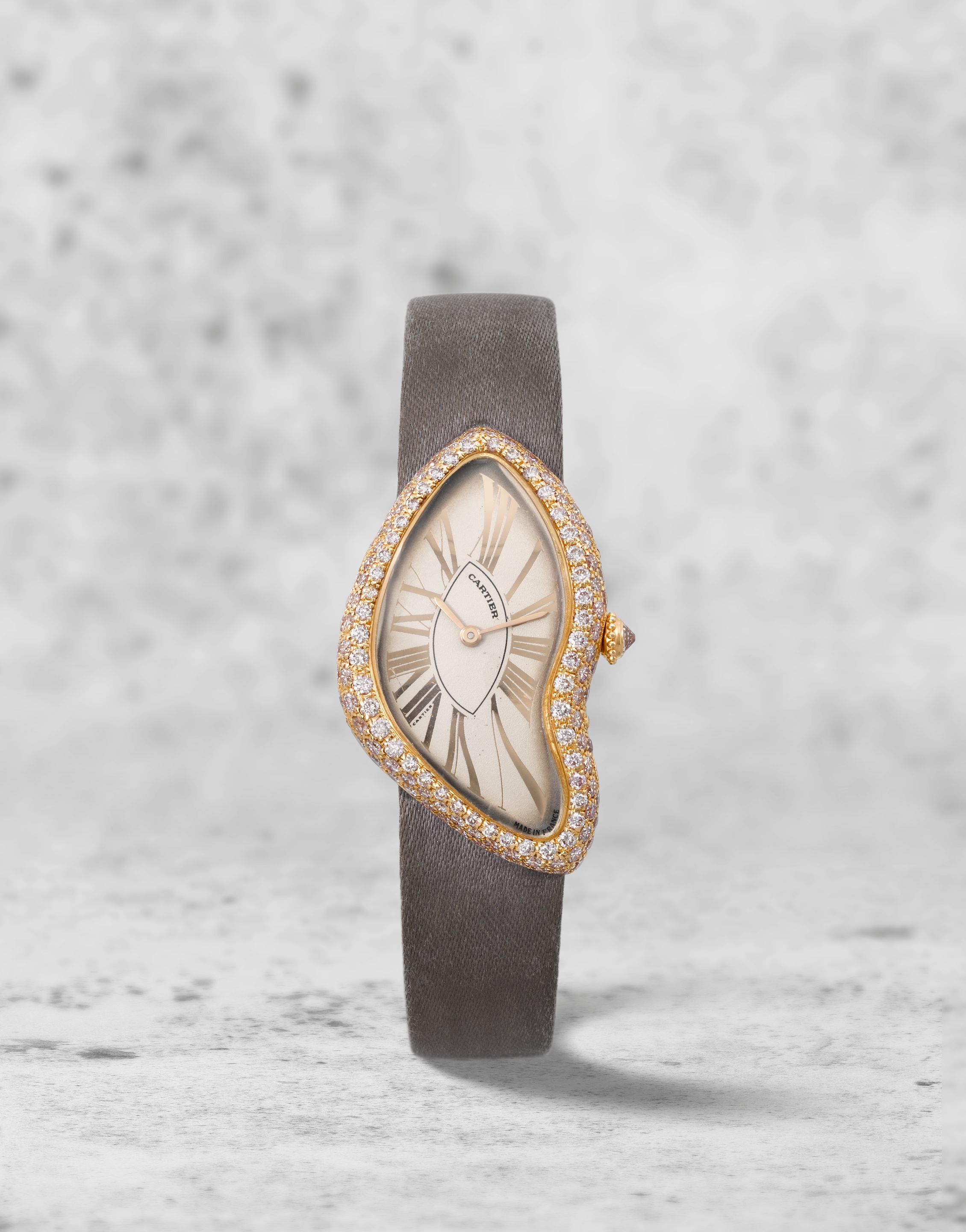 Cartier. A rare and unusual 18K rose gold manual wind wristwatch Crash, Ref: 2463, Circa 2001
