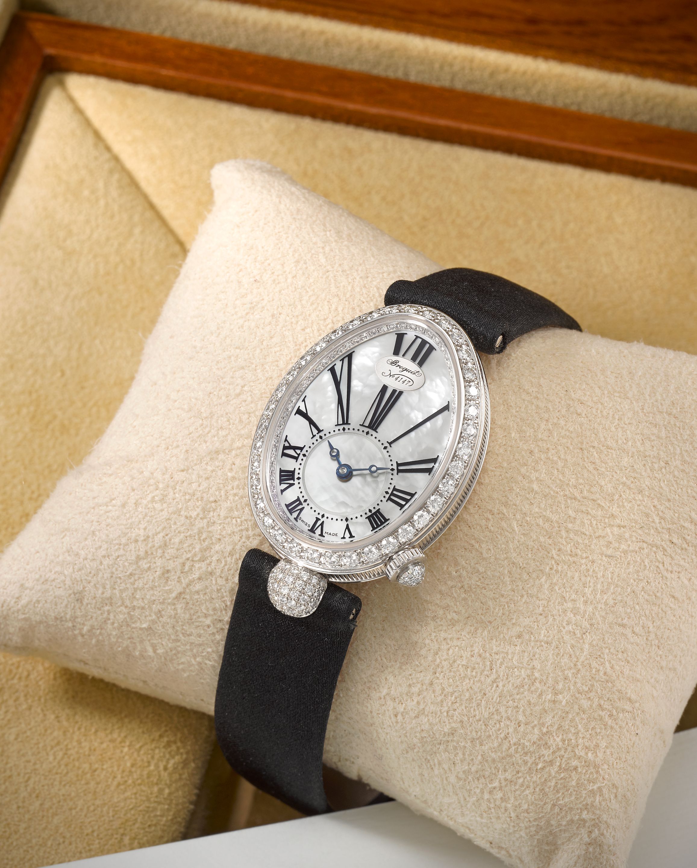 Breguet. A fine lady's 18K white gold diamond set wristwatch with mother of pearl dial Reine De Naples, Ref: 8928, Purchased 24th December 2007