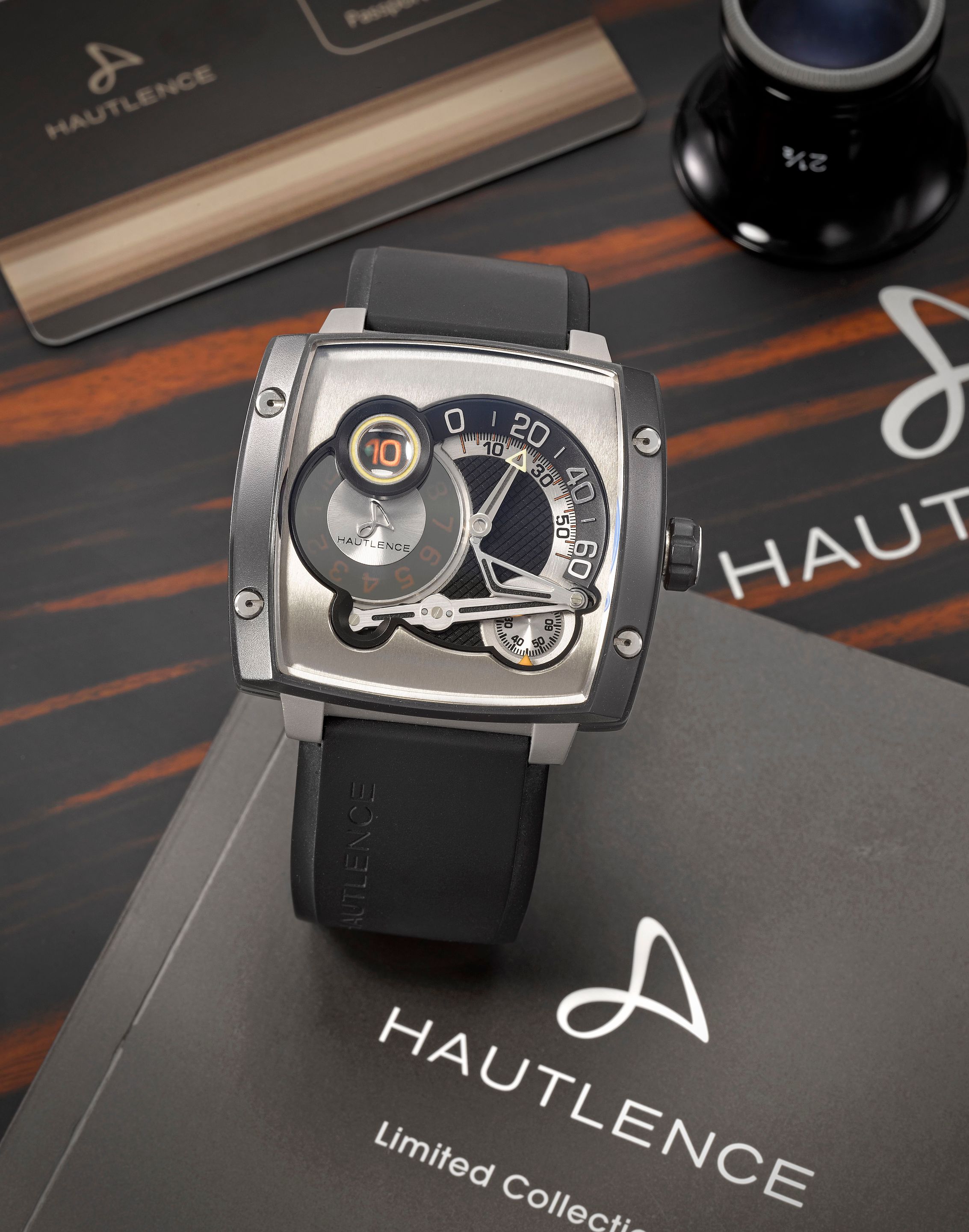 Hautlence. A fine and rare Limited Edition PVD coated titanium manual wind jump hour wristwatch with retrograde minutes Ref: HLS07, No.32/88, Circa 2005