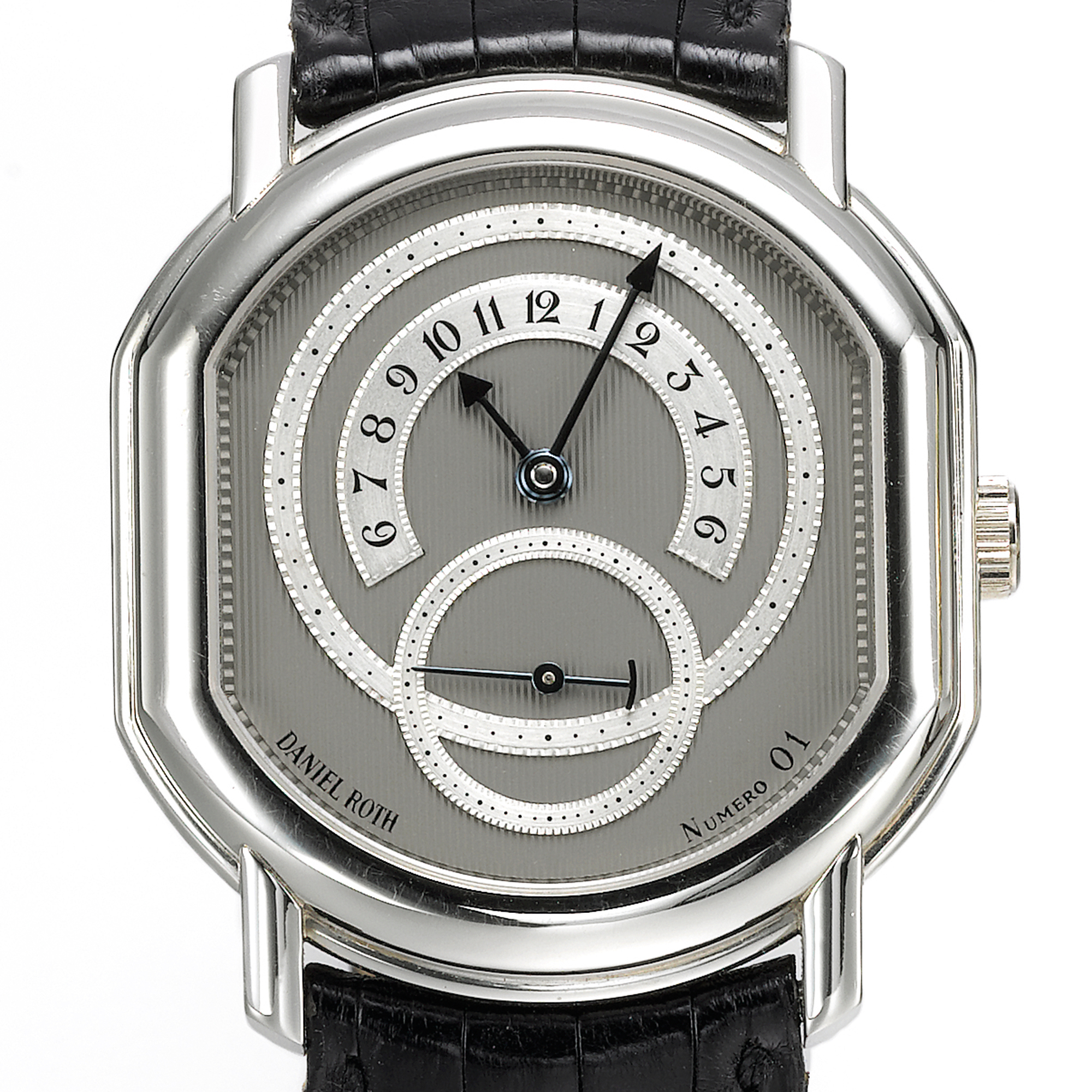 Daniel Roth, A PLATINUM ELLIPTICAL FORM WRISTWATCH WITH RETROGRADE HOURS CIRCA 1995 NO 1