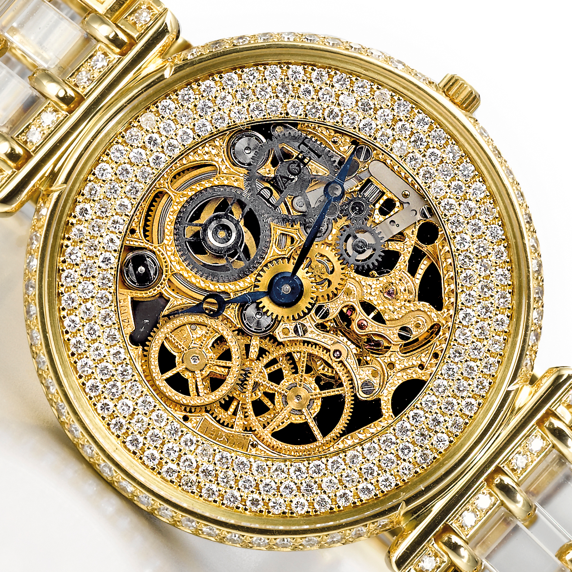 Piaget, A YELLOW GOLD, ROCK CRYSTAL AND DIAMOND SET SKELETONIZED BRACELET WATCH CIRCA 1980