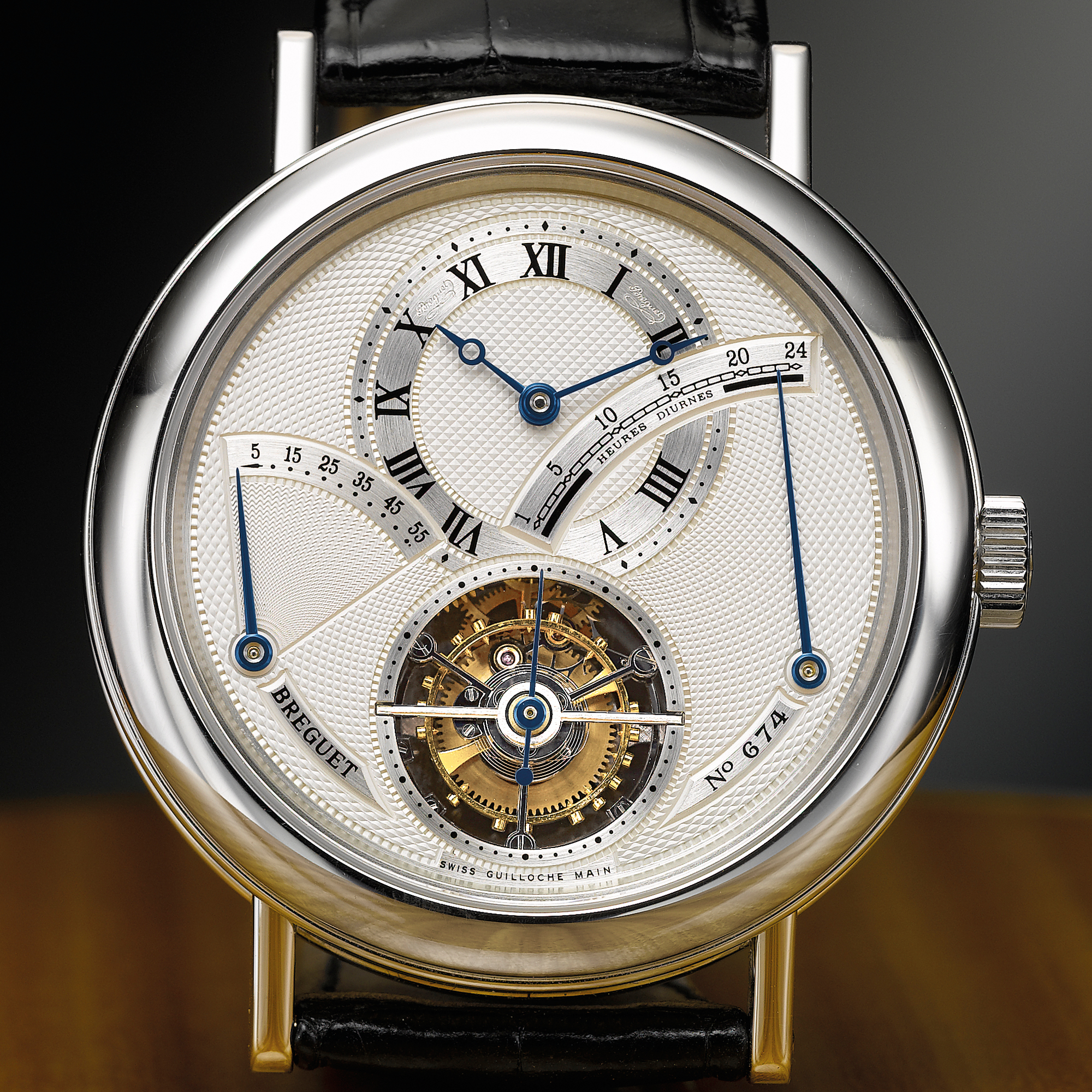 Breguet, A PLATINUM TOURBILLON WRISTWATCH WITH RETROGRADE POWER RESERVE AND 24-HOUR INDICATION CIRCA 2000 REF 3657 NO 674
