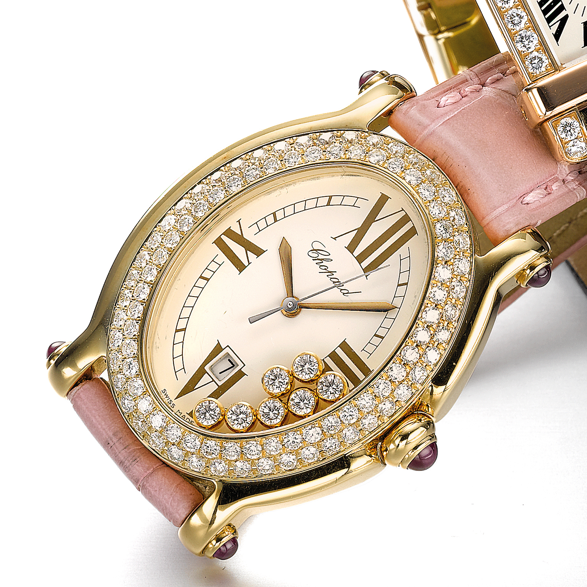 Chopard, A LADY'S YELLOW GOLD DIAMOND AND RUBY SET OVAL SHAPED CENTER SECONDS WRISTWATCH CIRCA 2002 HAPPY SPORT