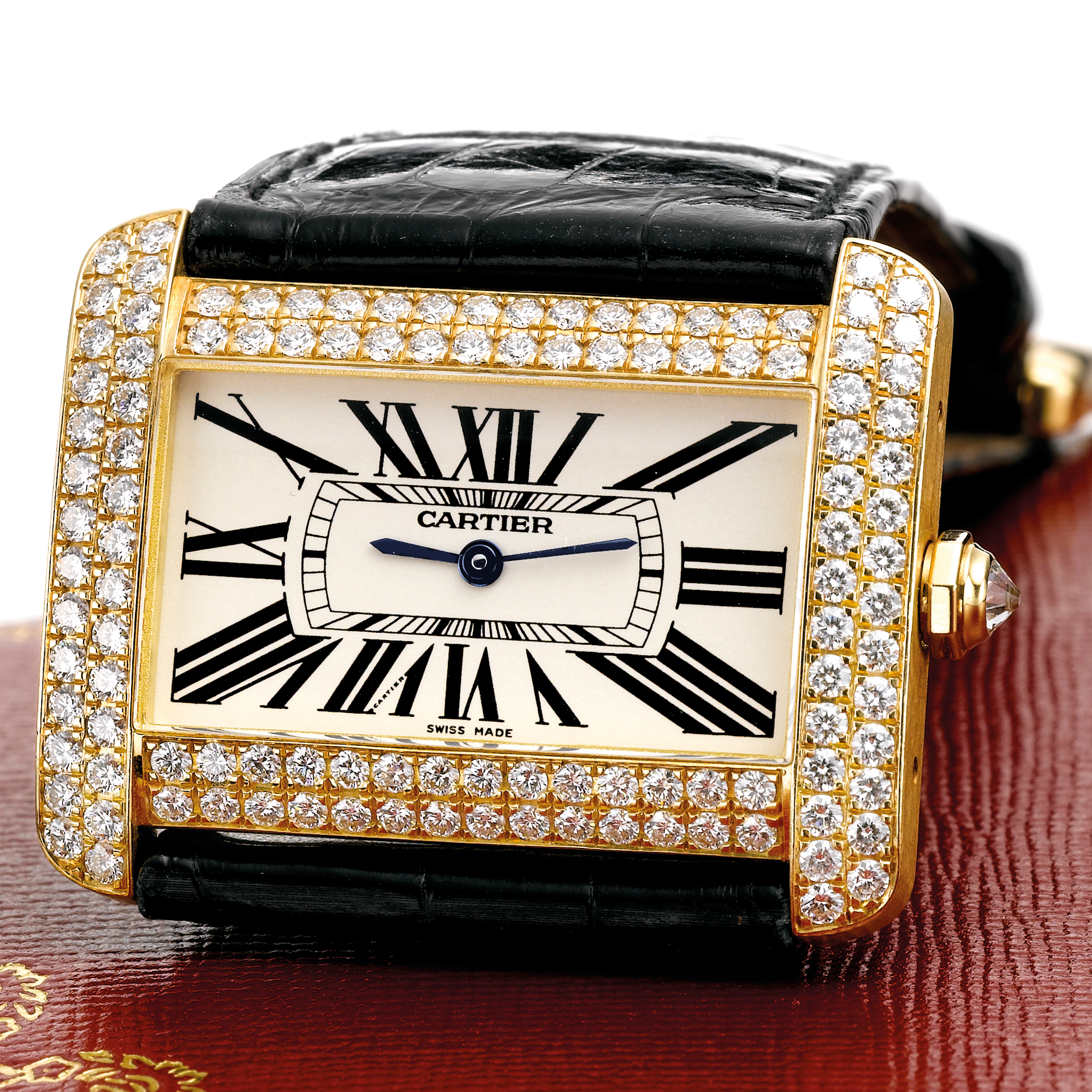 Cartier, A YELLOW GOLD AND DIAMOND SET RECTANGULAR WRISTWATCH CIRCA 2005 TANK DIVAN
 