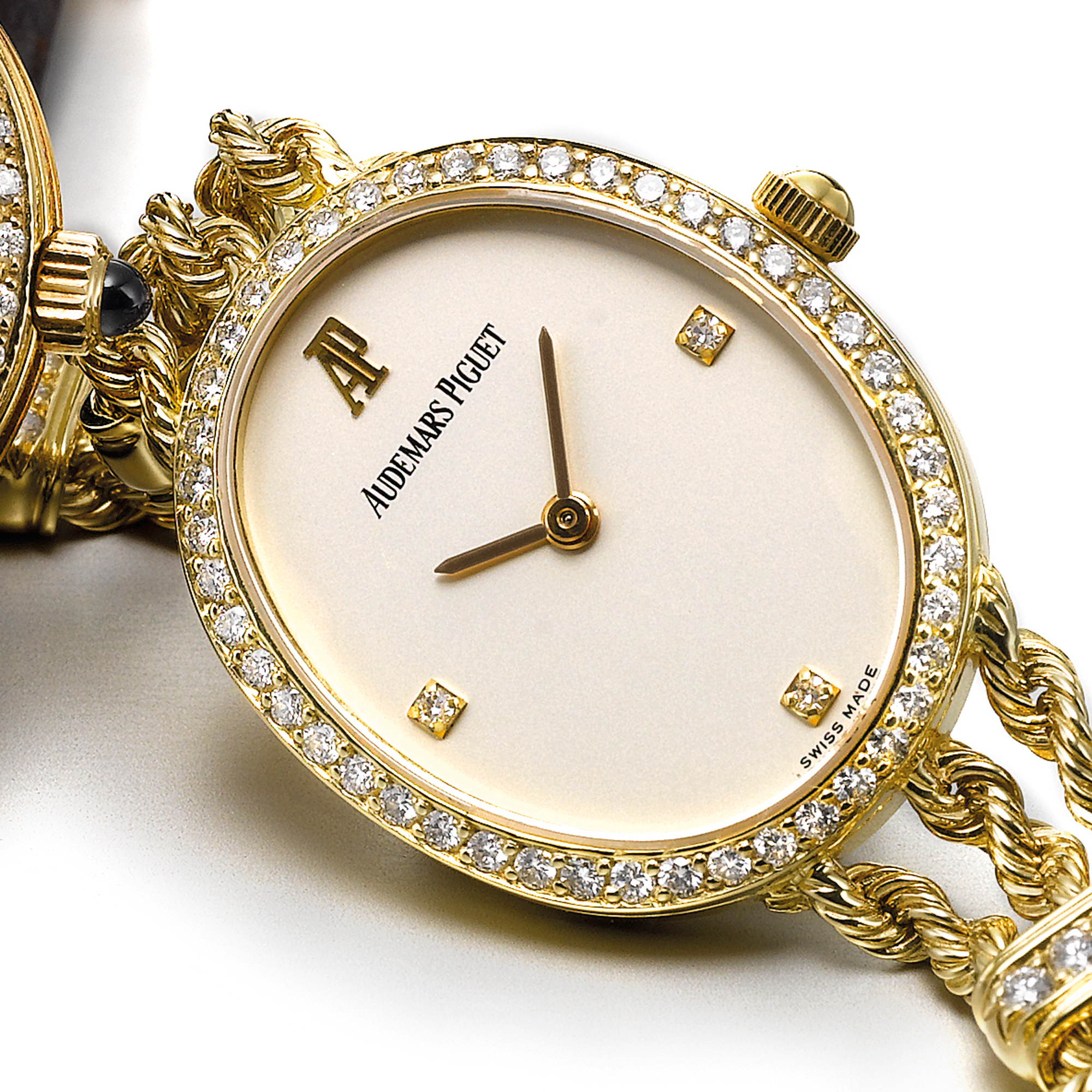 Audemars Piguet, A LADY'S YELLOW GOLD AND DIAMOND SET OVAL BRACELET WATCH CIRCA 1980 NO 30