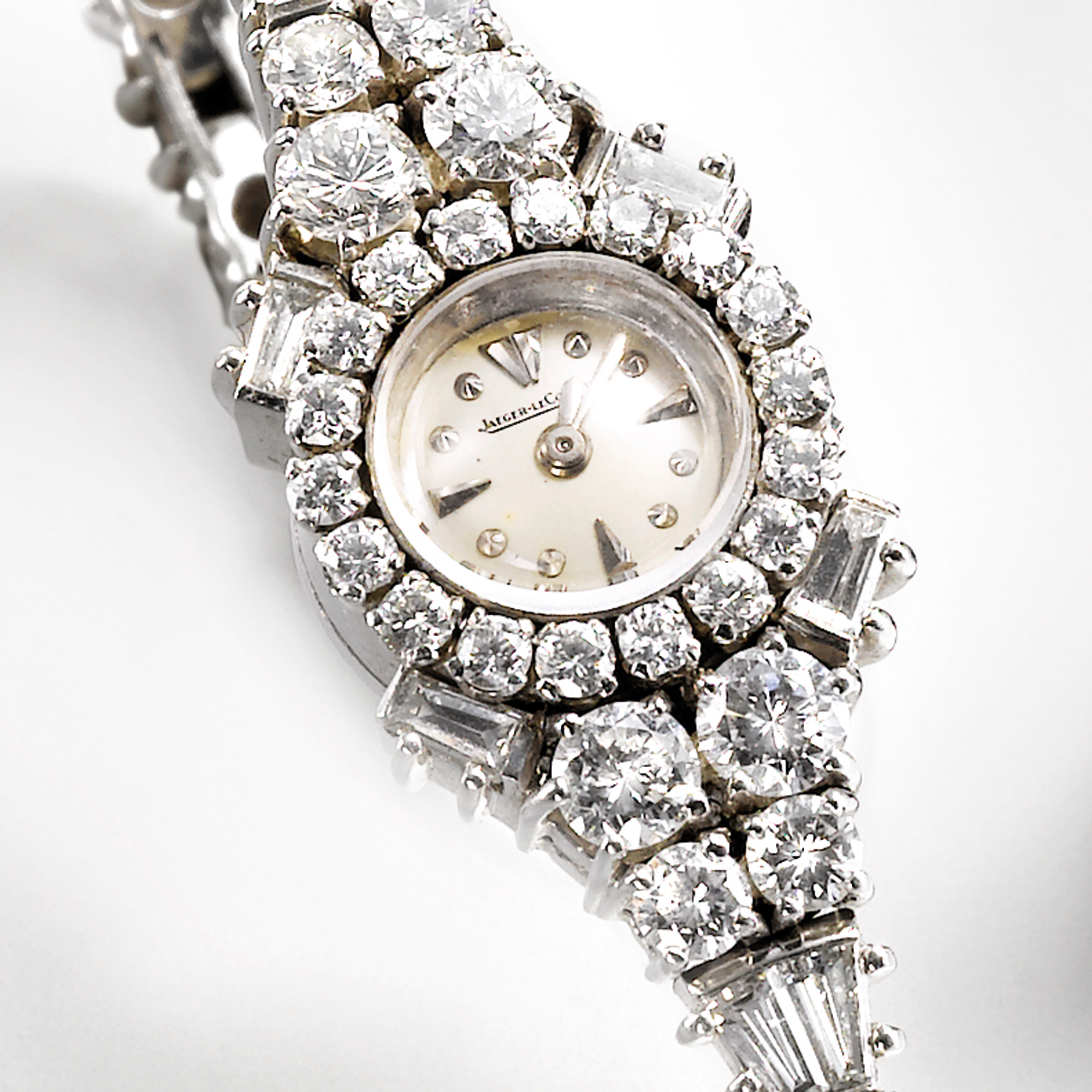 Jaeger Lecoultre, A LADY'S FINE PLATINUM AND DIAMOND SET BRACELET WATCH CIRCA 1965