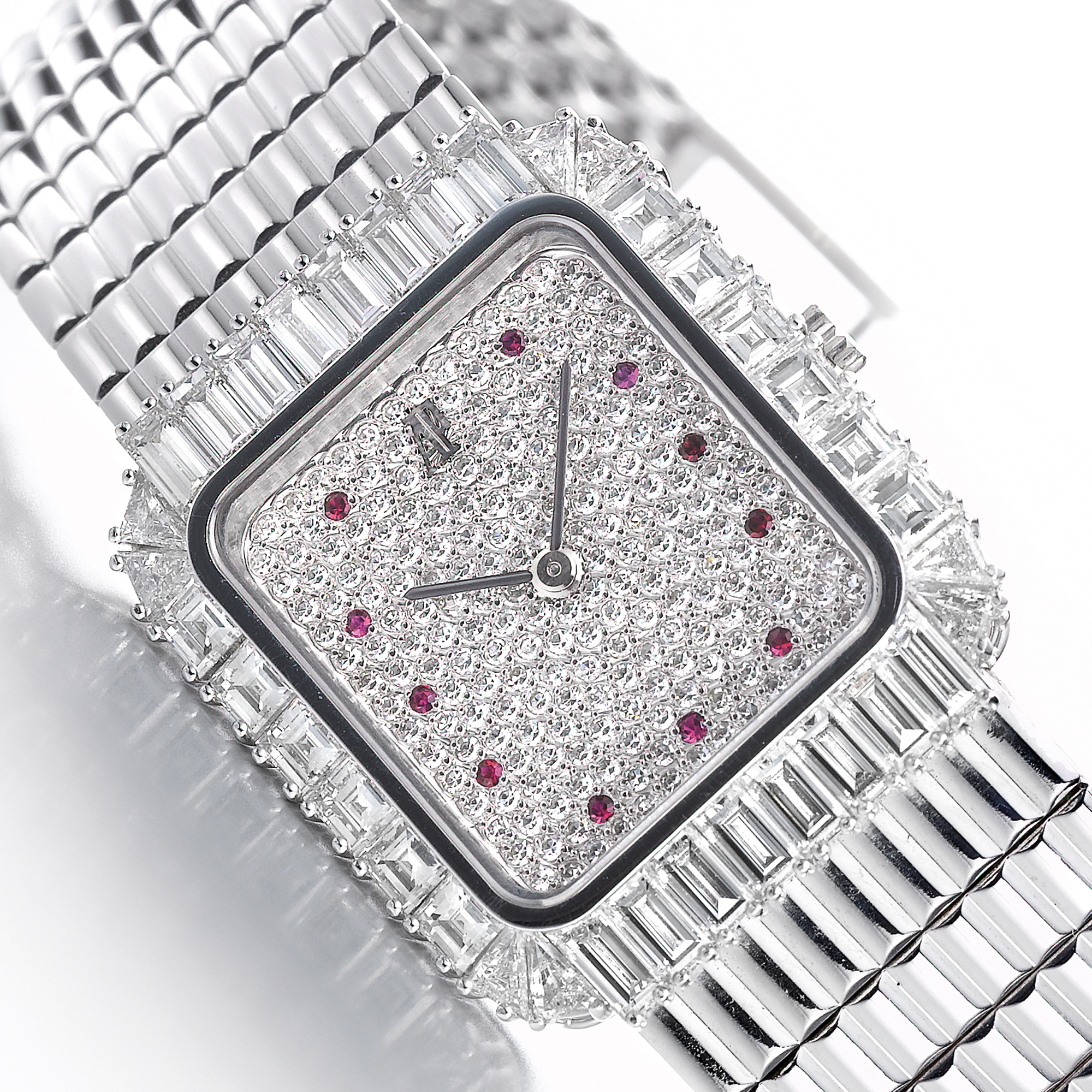 Audemars Piguet, A VERY FINE WHITE GOLD, DIAMOND AND RUBY SET RECTANGULAR BRACELET WATCH CIRCA 1990