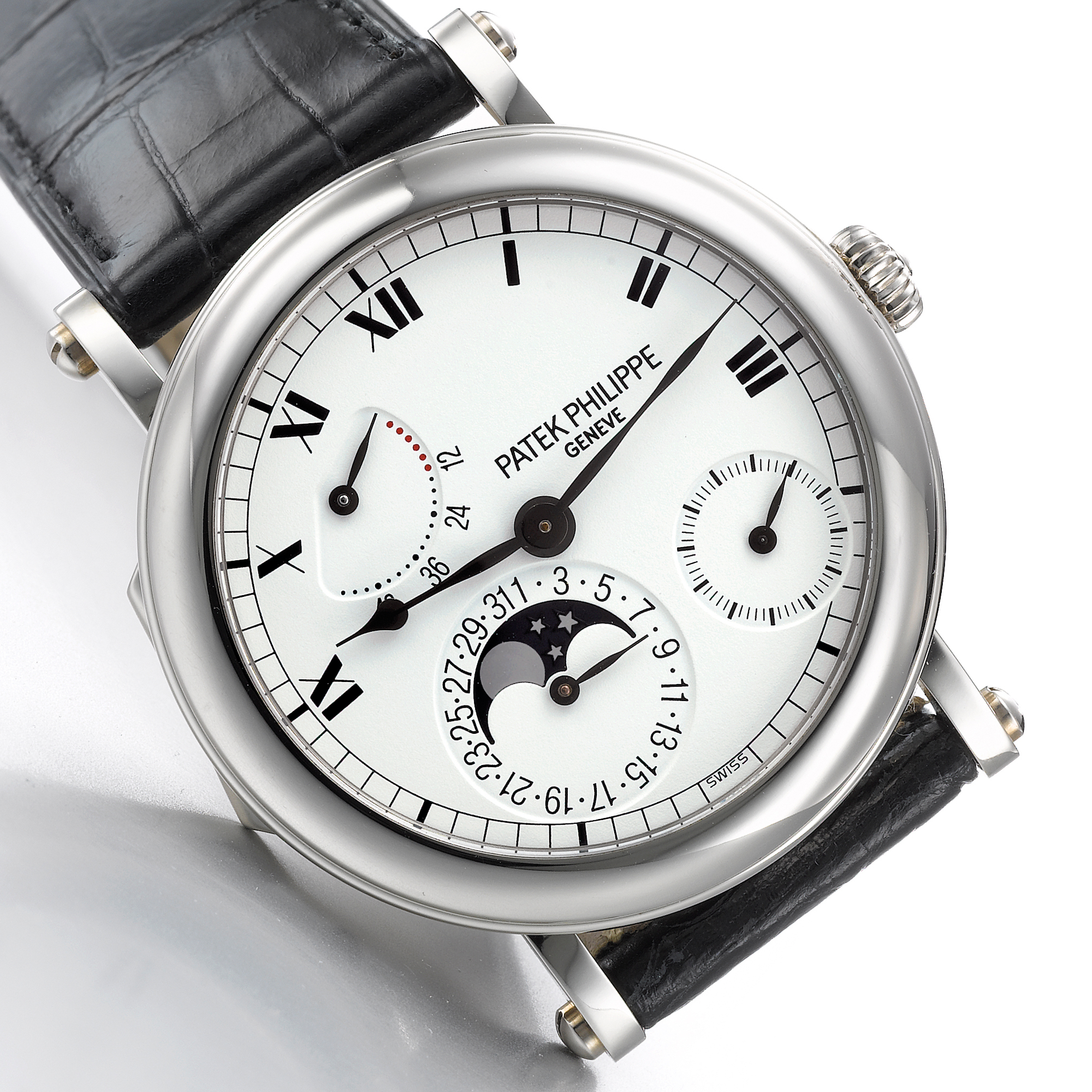 Patek Philippe, A FINE WHITE GOLD AUTOMATIC WRISTWATCH WITH DATE, MOON-PHASES AND POWER RESERVE INDICATION CIRCA 2002 REF 5054G MVT 3167762 CASE 4202248