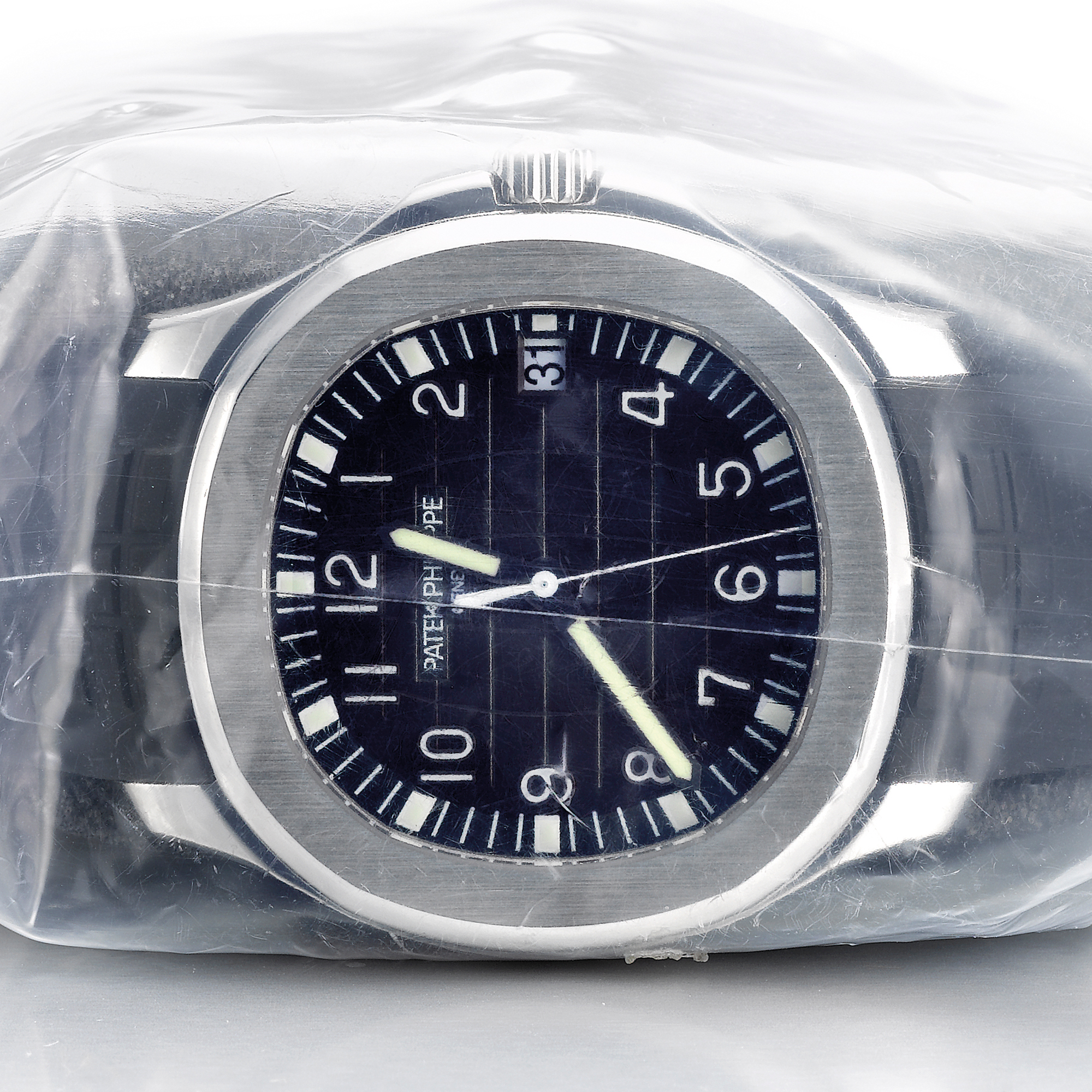 Patek Philippe, A LARGE STAINLESS STEEL CUSHION FORM CENTER SECONDS WRISTWATCH WITH DATE CIRCA 2007 REF 5167A AQUANAUT MVT 3716931 CASE 4420769