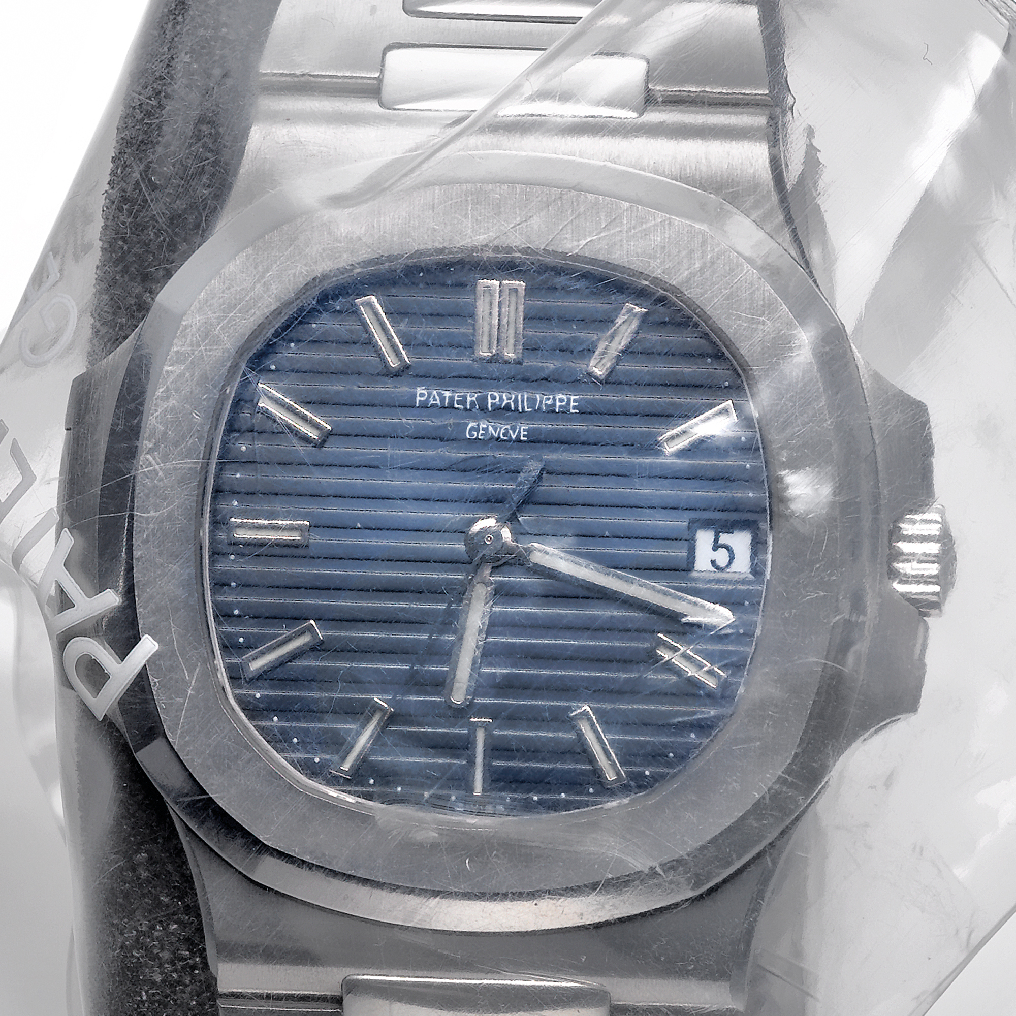 Patek Philippe, A FINE AND RARE STAINLESS STEEL CUSHION FORM CENTER SECONDS BRACELET WATCH WITH DATE CIRCA 2008 REF 5711/1A NAUTILUS MVT 3408372 CASE 4397794