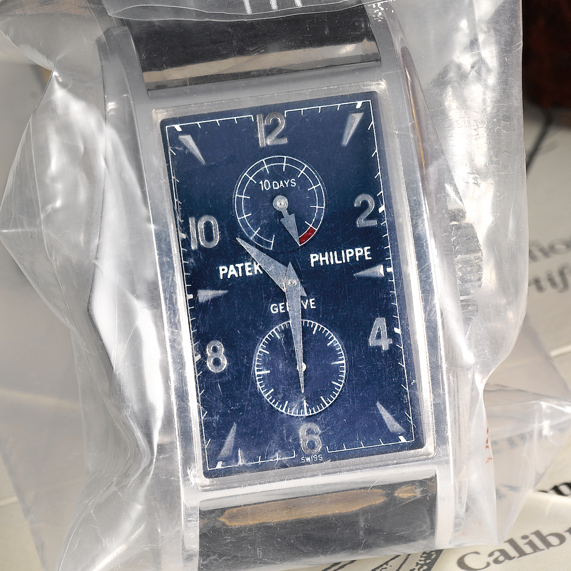 Patek Philippe, A FINE AND LIMITED EDITION WHITE GOLD FLARED RECTANGULAR WRISTWATCH WITH TEN-DAY POWER RESERVE INDICATION 2000 REF. 5100G MVT 3203355 CASE 4124420
