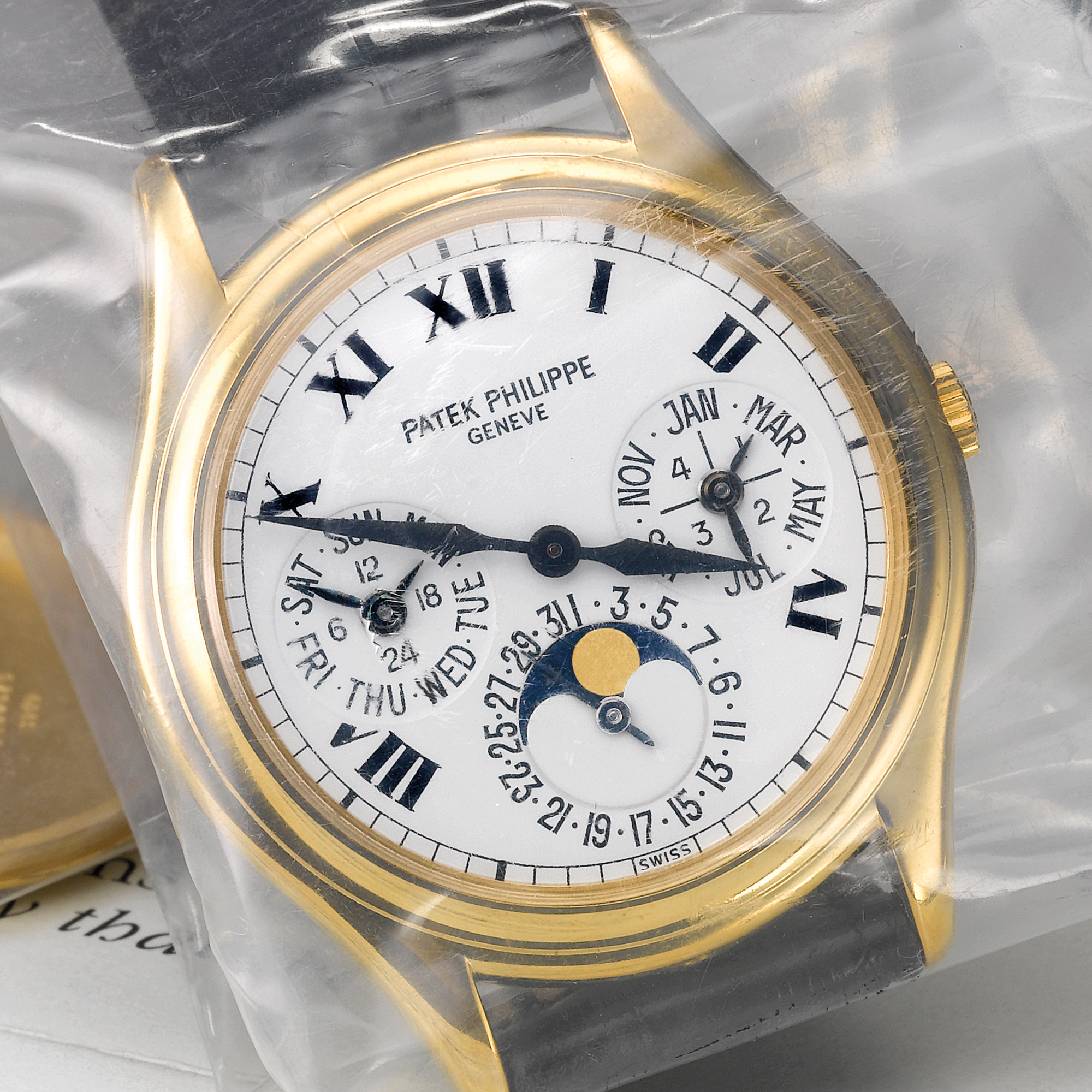 Patek Philippe, A FINE AND RARE YELLOW GOLD AUTOMATIC PERPETUAL CALENDAR WRISTWATCH WITH  MOON-PHASES, 24-HOUR AND LEAP YEAR INDICATION REF 3940J  MVT 3127280 CASE 4260874 