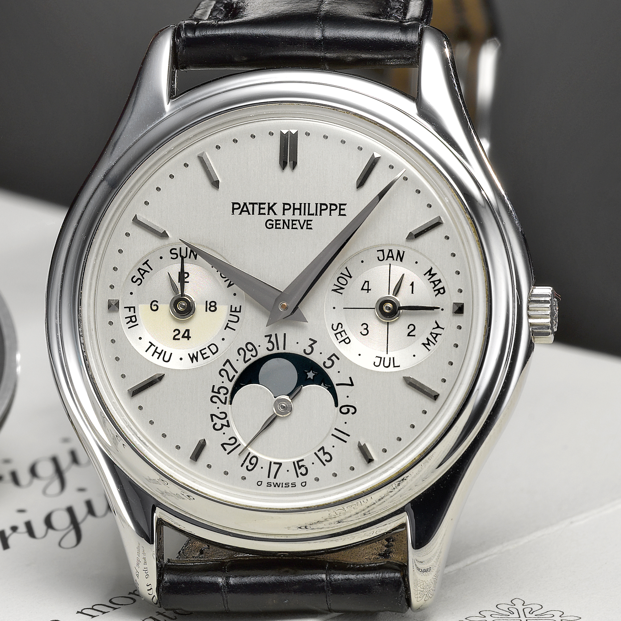 Patek Philippe, A FINE AND RARE PLATINUM AUTOMATIC PERPETUAL CALENDAR WRISTWATCH WITH MOON-PHASES, 24-HOUR AND LEAP YEAR INDICATION CIRCA 1999 REF 3940P MVT 3424790 CASE 4087093