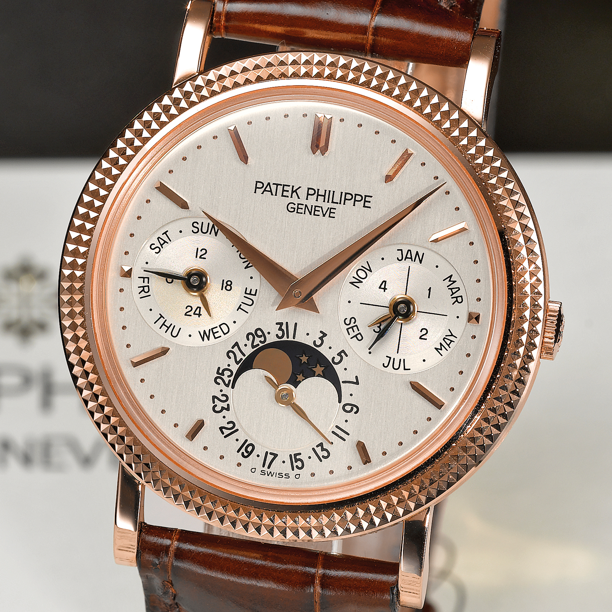 Patek Philippe, A FINE PINK GOLD AUTOMATIC PERPETUAL CALENDAR WRISTWATCH WITH MOON-PHASES, 24 HOUR AND LEAP YEAR INDICATION CIRCA 2003 REF 5039R CASE MVT 3126076