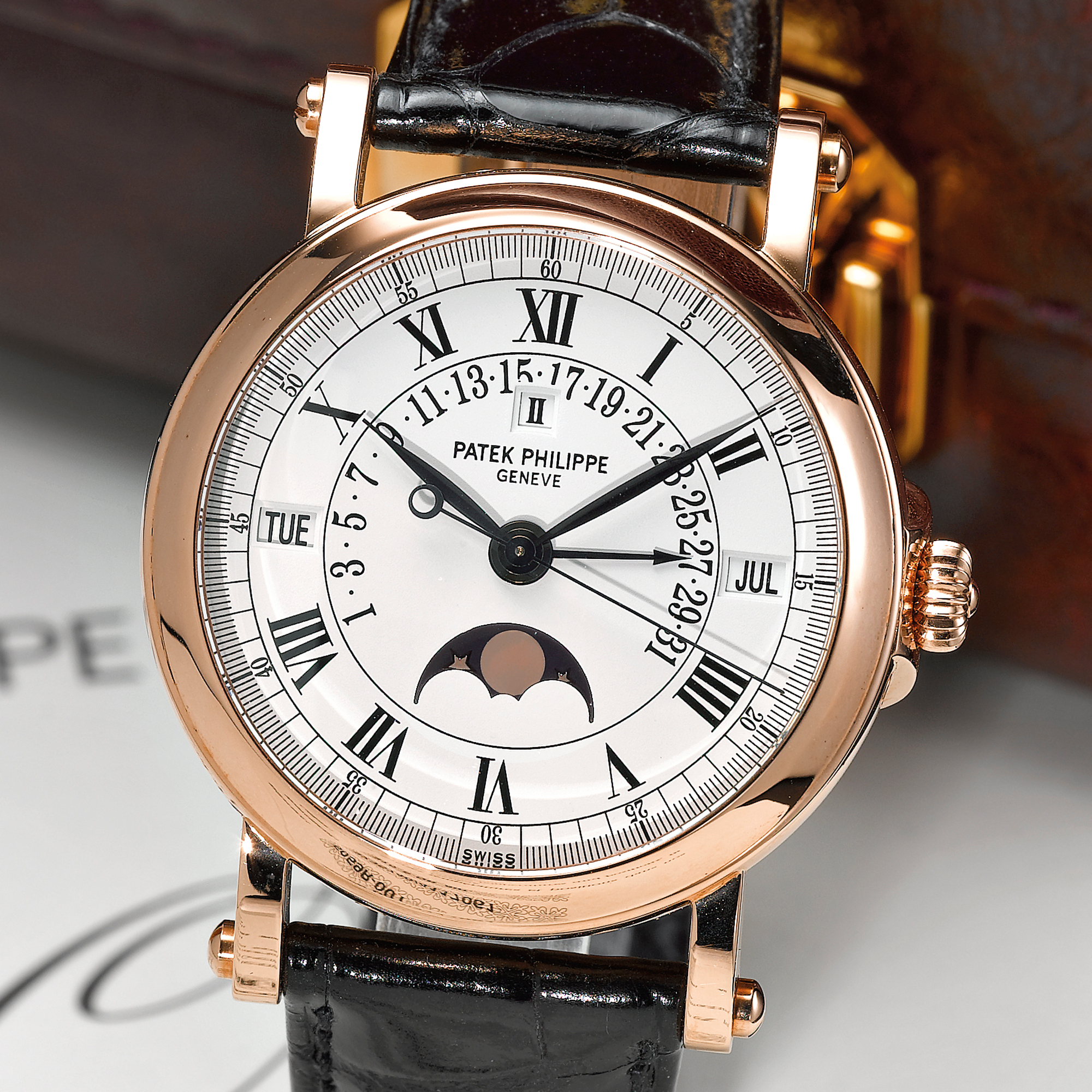 Patek Philippe, A FINE PINK GOLD AUTOMATIC CENTER SECONDS RETROGRADE PERPETUAL CALENDAR WRISTWATCH WITH MOON-PHASES AND LEAP YEAR INDICATION CIRCA 2007 REF 5059R MVT 3235740 CASE 4117061