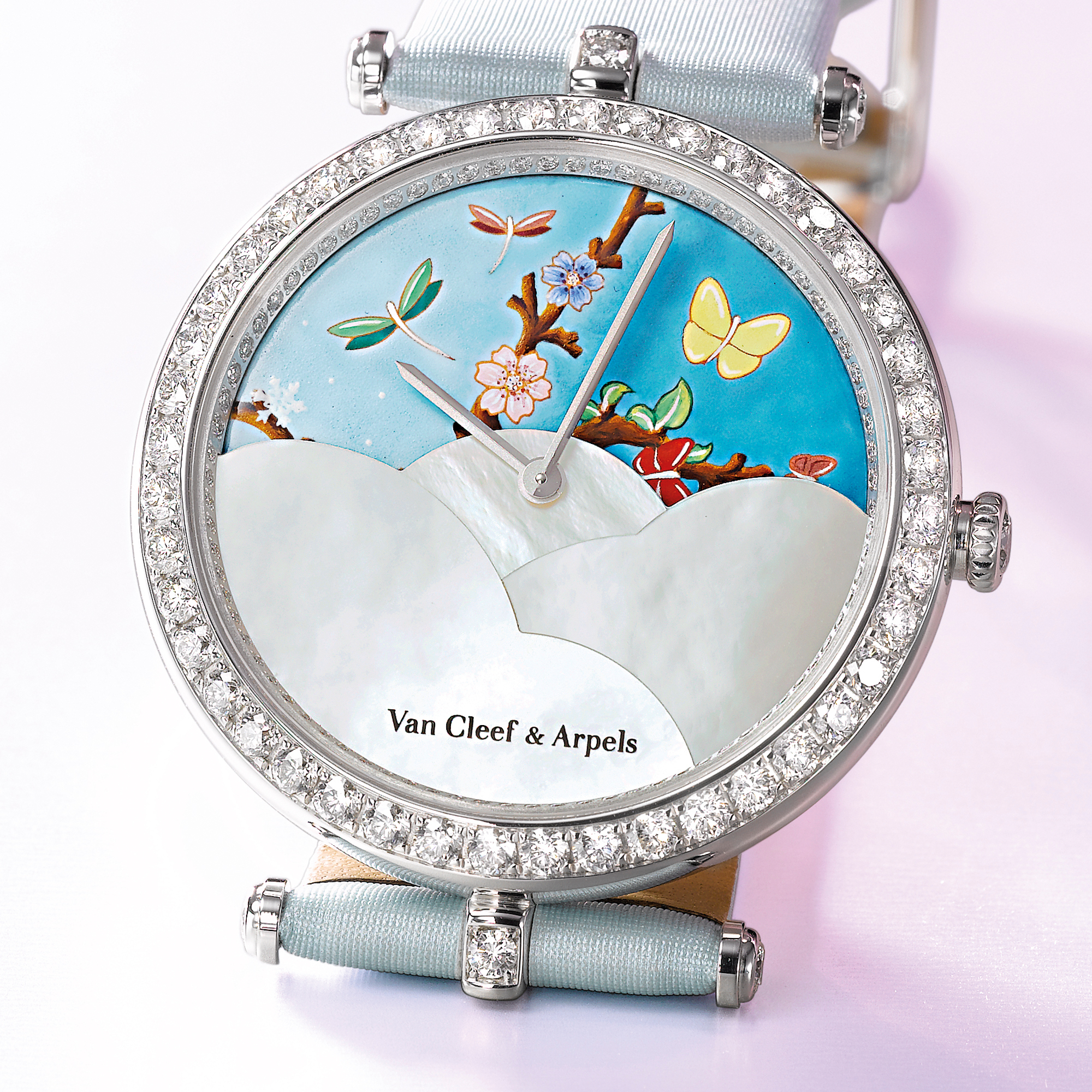 VAN CLEEF & ARPELS, A LADY'S FINE LIMITED EDITION WHITE GOLD AND DIAMOND SET WRISTWATCH WITH DATE AND MONTH INDICATION WITH MOTHER-OF-PEARL AND ENAMEL DIALCIRCA 2006 LADY ARPELS CENTENAIRE NO 99/100