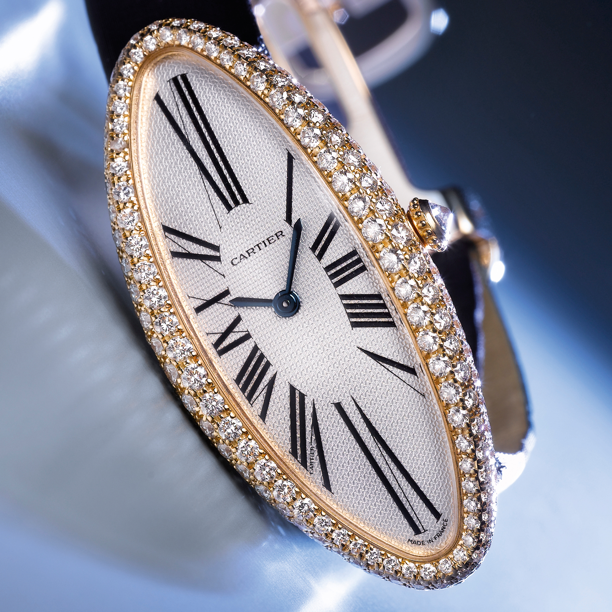 Cartier, A LADY'S FINE PINK GOLD AND DIAMOND SET OVAL FORM WRISTWATCH CIRCA 2004 BAIGNOIRE ALLONGEE