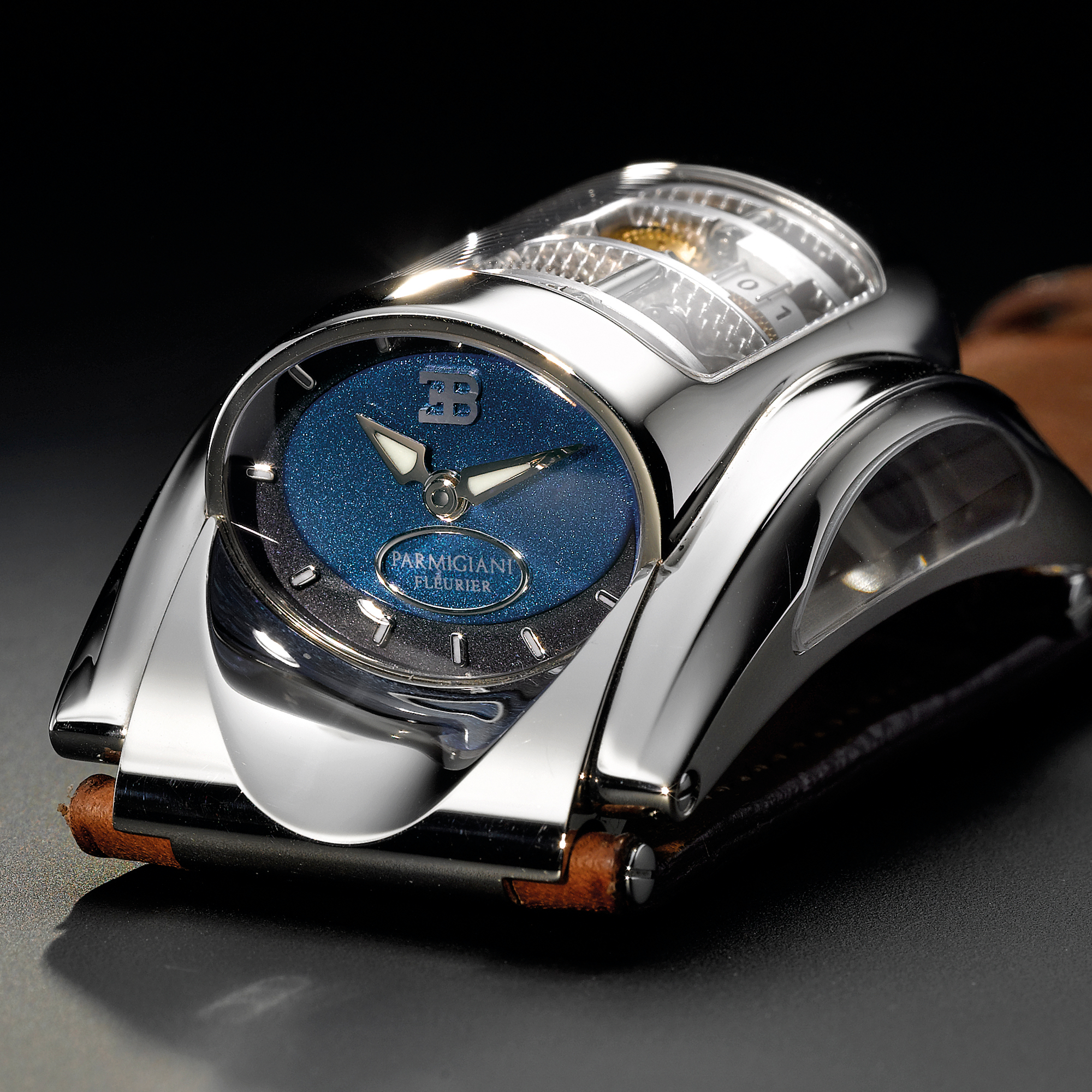 PARMIGIANI, A HIGHLY REVOLUTIONARY AND VERY RARE LIMITED EDITION WHITE GOLD CYLINDRICAL WRISTWATCH WITH 10-DAY POWER RESERVE INDICATION CIRCA 2004 BUGATTI TYPE 370 NO 06/10
