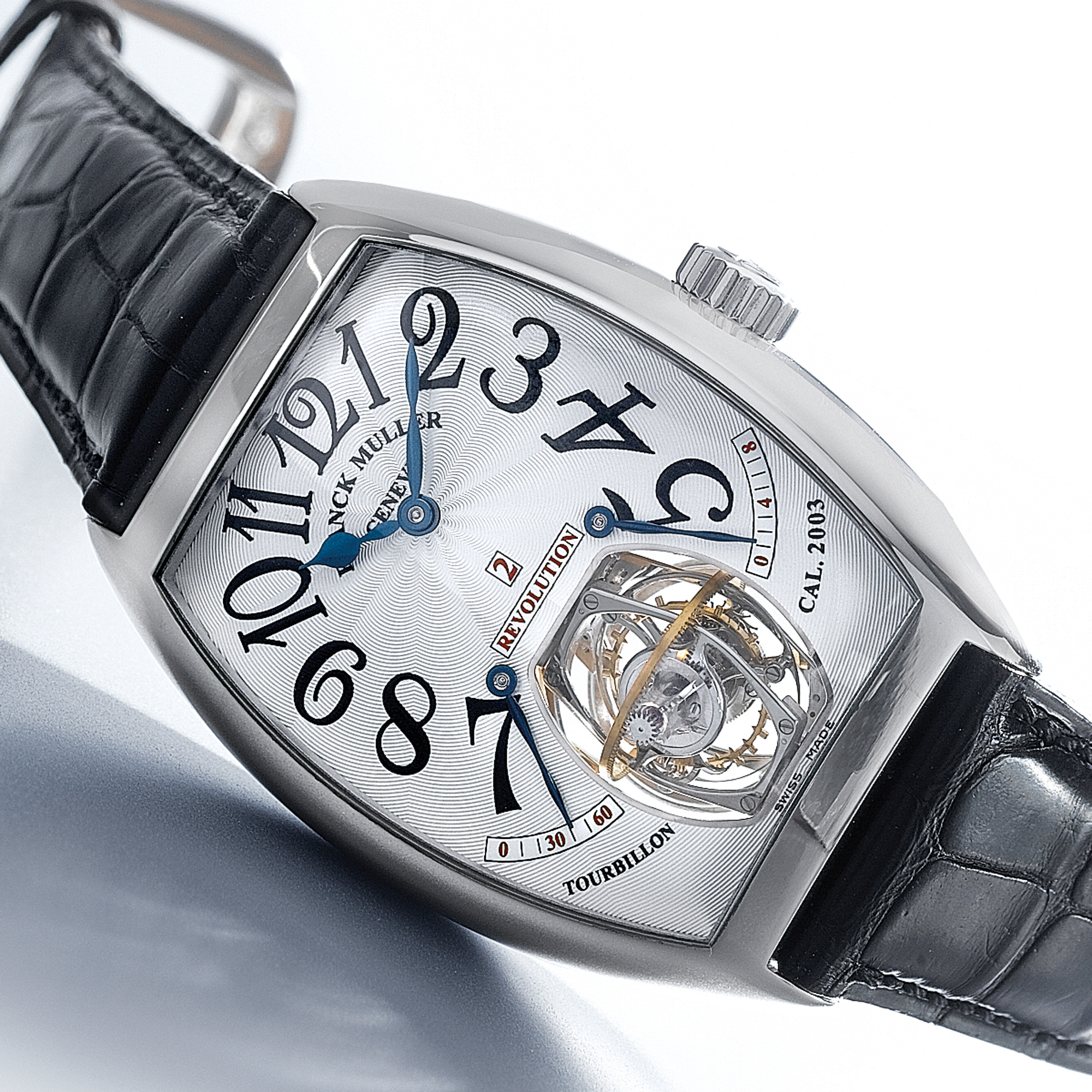 Franck Muller, AN EXTRAORDINARY PLATINUM THREE DIMENSIONAL DUAL AXIS TONNEAU FORM WRISTWATCH WITH 2 RETROGRADE SECONDS AND 8 MINUTES INDICATION CIRCA 2004 REVOLUTION 2 TOURBILLON NO 1