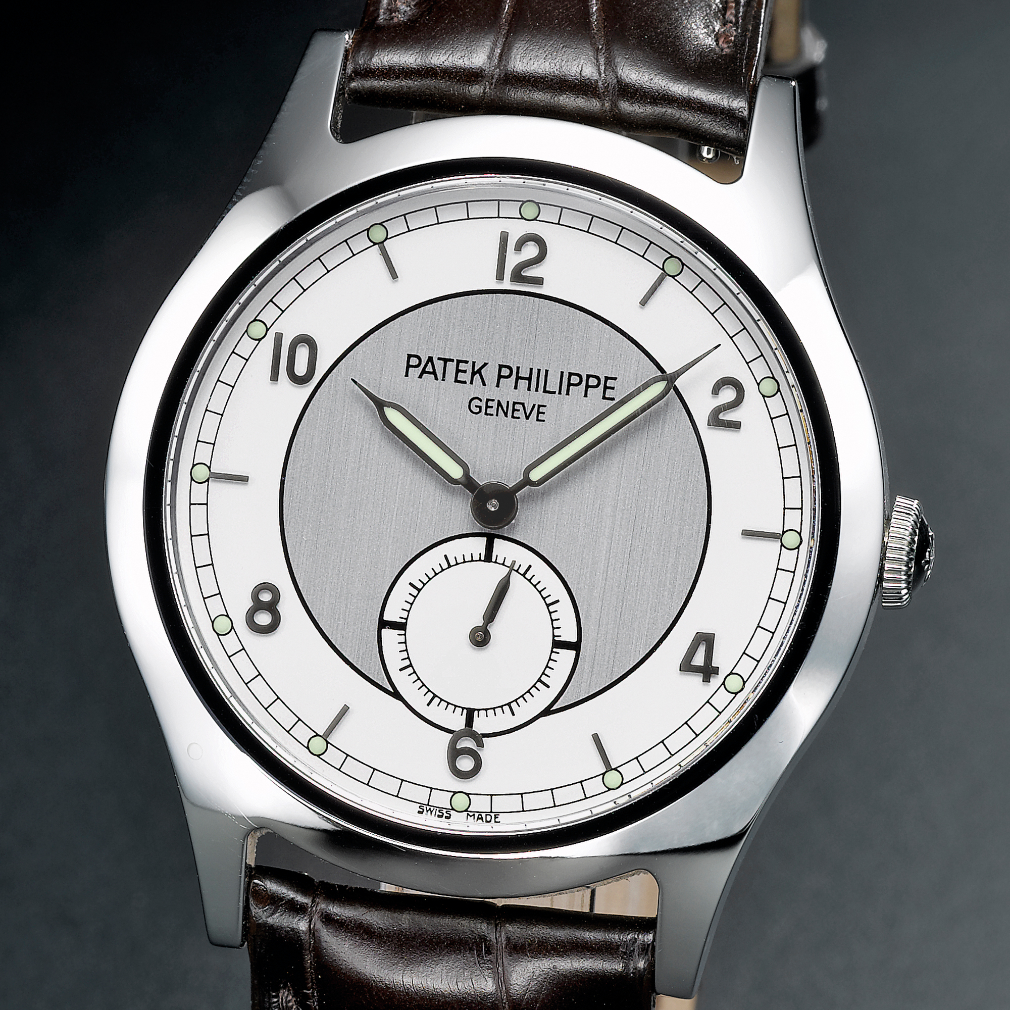 Patek Philippe,  A FINE AND RARE LIMITED EDITION STAINLESS STEEL WRISTWATCH WITH TWO-TONE DIAL CIRCA 2007 REF 5565A-001 CALATRAVA MVT 1901916 CASE 4381703