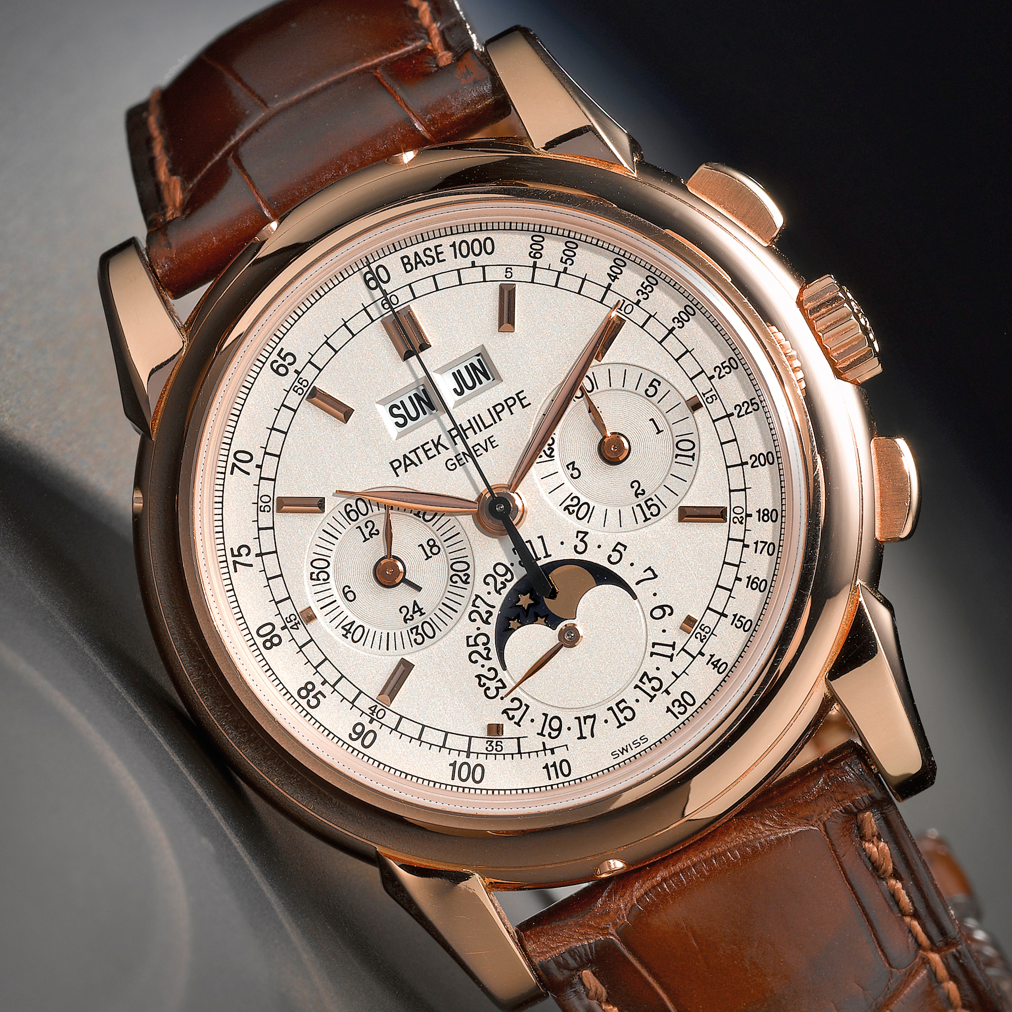 Patek Philippe, A FINE AND RARE PINK GOLD PERPETUAL CALENDAR CHRONOGRAPH WRISTWATCH WITH REGISTERS AND MOON-PHASES, 24-HOUR AND LEAP YEAR INDICATION CIRCA 2006 REF 5970R MVT 3048065 CASE 4315181