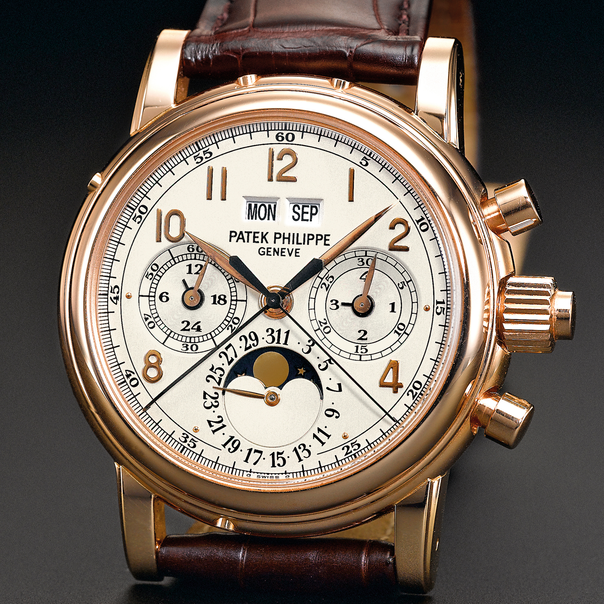 Patek Philippe, A FINE AND VERY RARE PINK GOLD PERPETUAL CALENDAR SPILT SECONDS CHRONOGRAPH WRISTWATCH WITH REGISTERS AND MOON-PHASES, 24-HOUR AND LEAP YEAR INDICATION CIRCA 2005 REF 5004R MVT 879989 CASE 4115673 