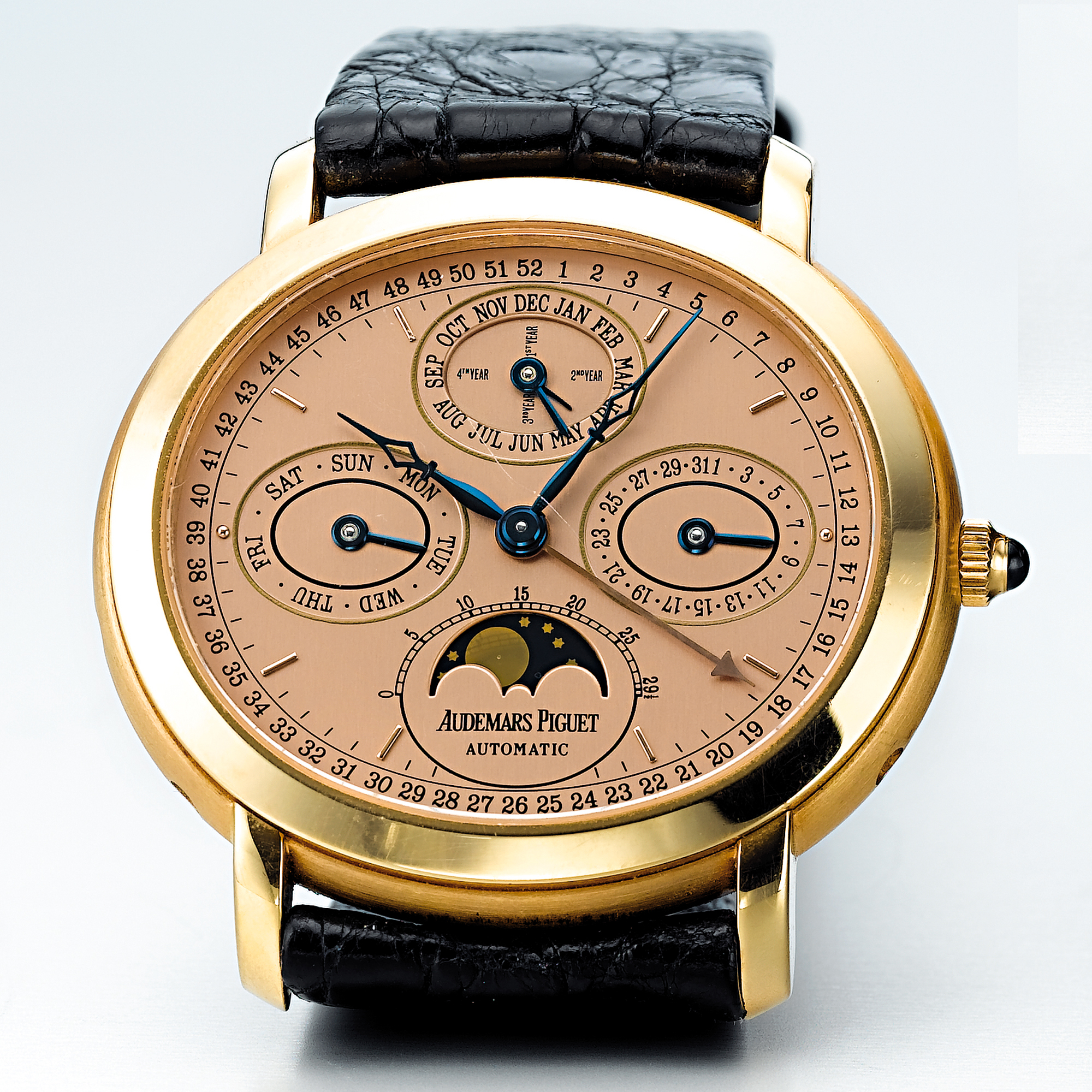 AUDEMARS PIGUET, A PINK GOLD AUTOMATIC OVAL PERPETUAL CALENDAR WRISTWATCH WITH MOON-PHASESCIRCA 2000 MILLENARY NO 039