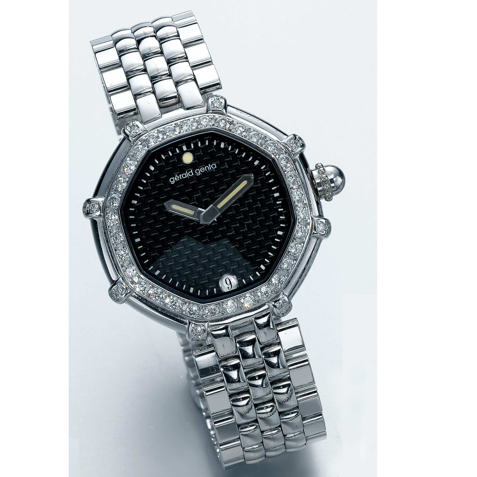 GERALD GENTA, A WHITE GOLD AND DIAMOND SET AUTOMATIC BRACELET WATCH WITH DATE CIRCA 2000 SUCCESS