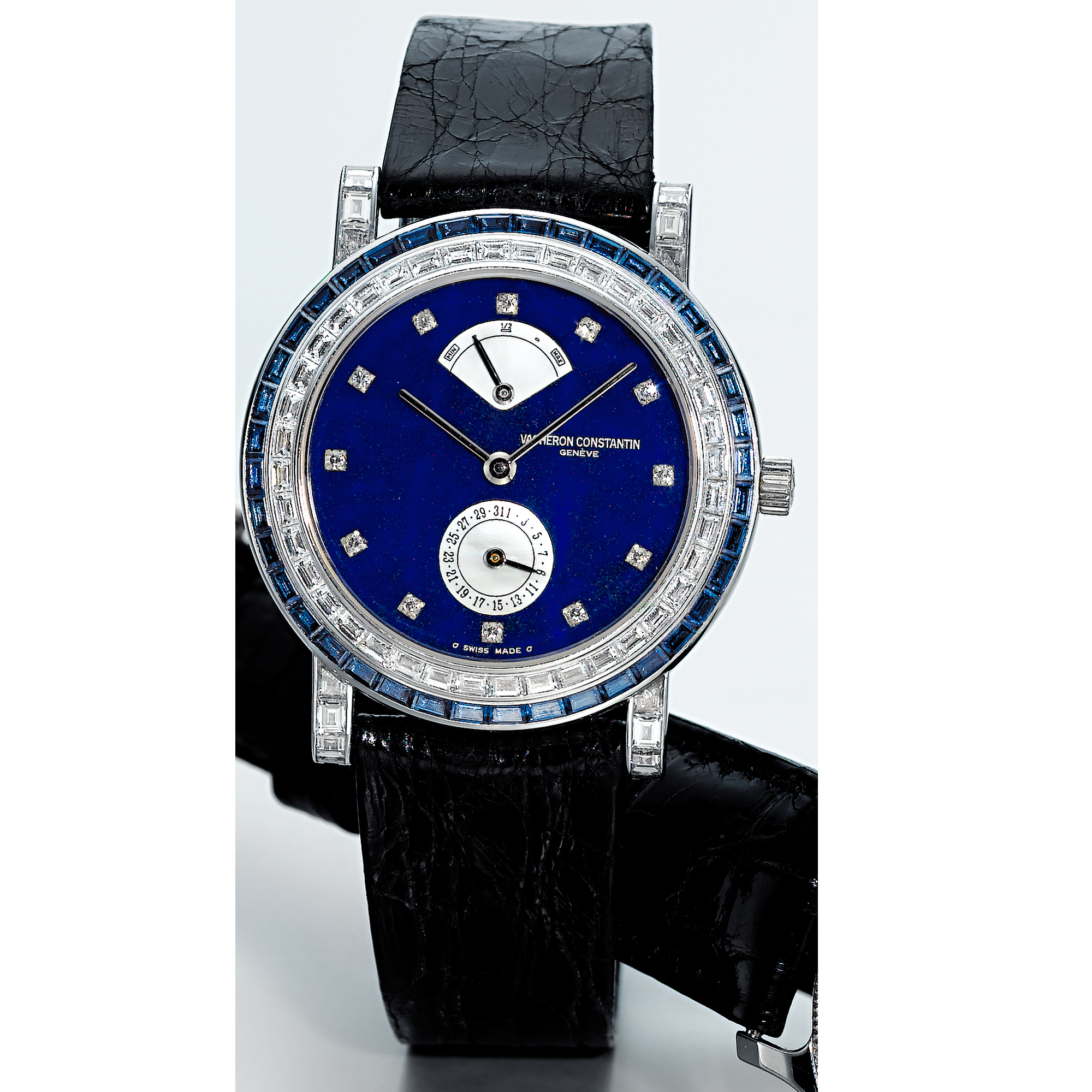 VACHERON CONSTANTIN, A WHITE GOLD DIAMOND AND SAPPHIRE SET AUTOMATIC WRISTWATCH WITH POWER RESERVE, DATE, LAPIS LAZULI AND MOTHER-OF-PEARL DIALCIRCA 1995