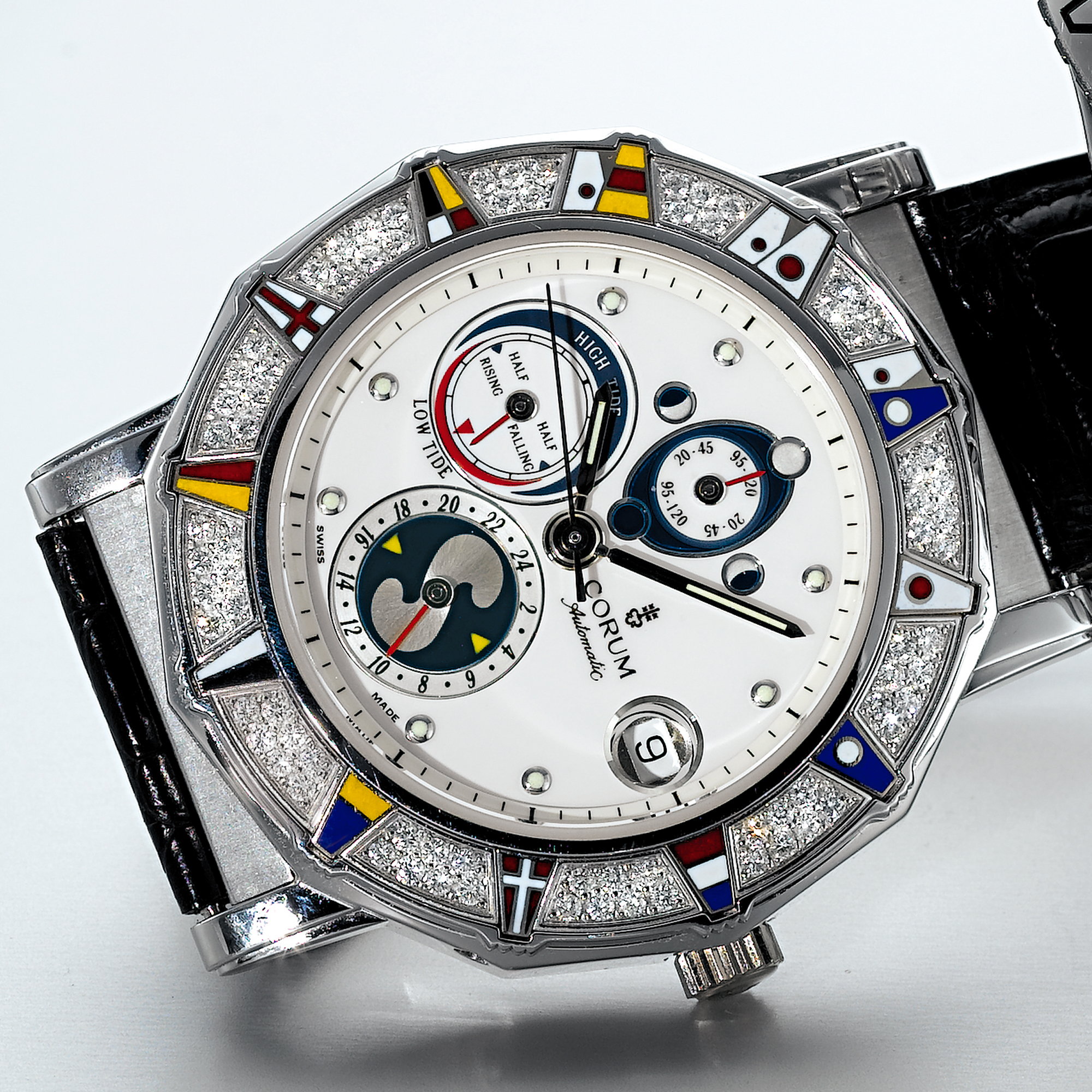 CORUM, A WHITE GOLD AND DIAMOND SET AUTOMATIC CENTRE SECONDS DODECAHEDRAL WRISTWATCH WITH TIDE INDICATION, MOON-PHASES AND DATE CIRCA 2003 ADMIRAL'S CUP MAREES