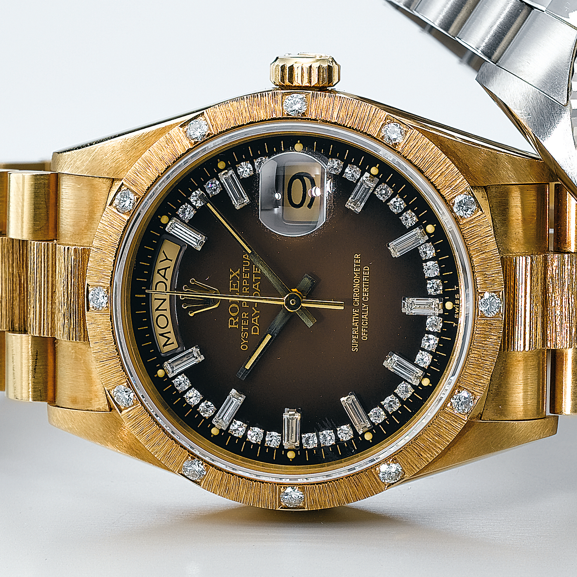 ROLEX, A GOLD AND DIAMOND AUTOMATIC CENTRE SECONDS WRISTWATCH WITH DAY, DATE AND BRACELETCIRCA 1985 REF 18108 OYSTER PERPETUAL DAY-DATE