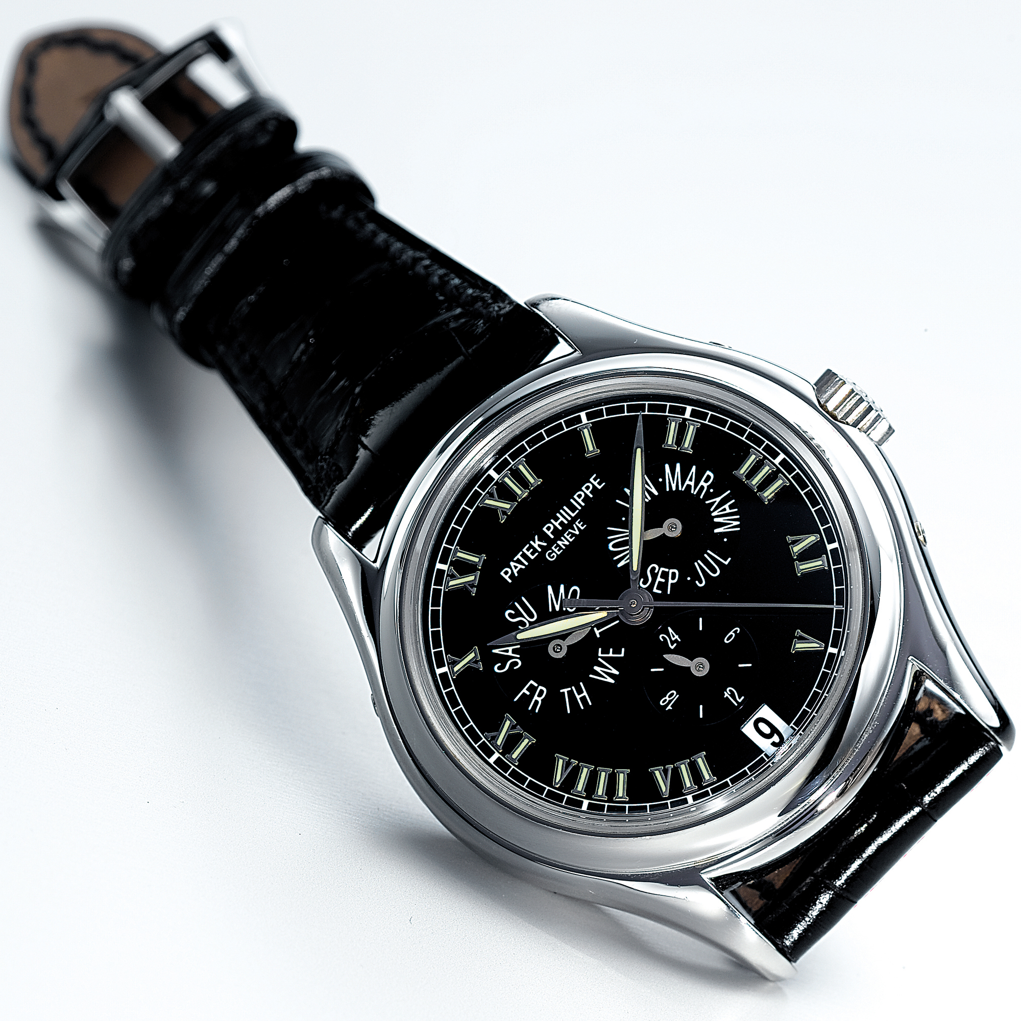 A FINE PLATINUM AUTOMATIC CENTRE SEONDS ANNUAL CALDENDAR WRISTWATCH CIRCA 2005 REF.5035 MVT 3.055.370