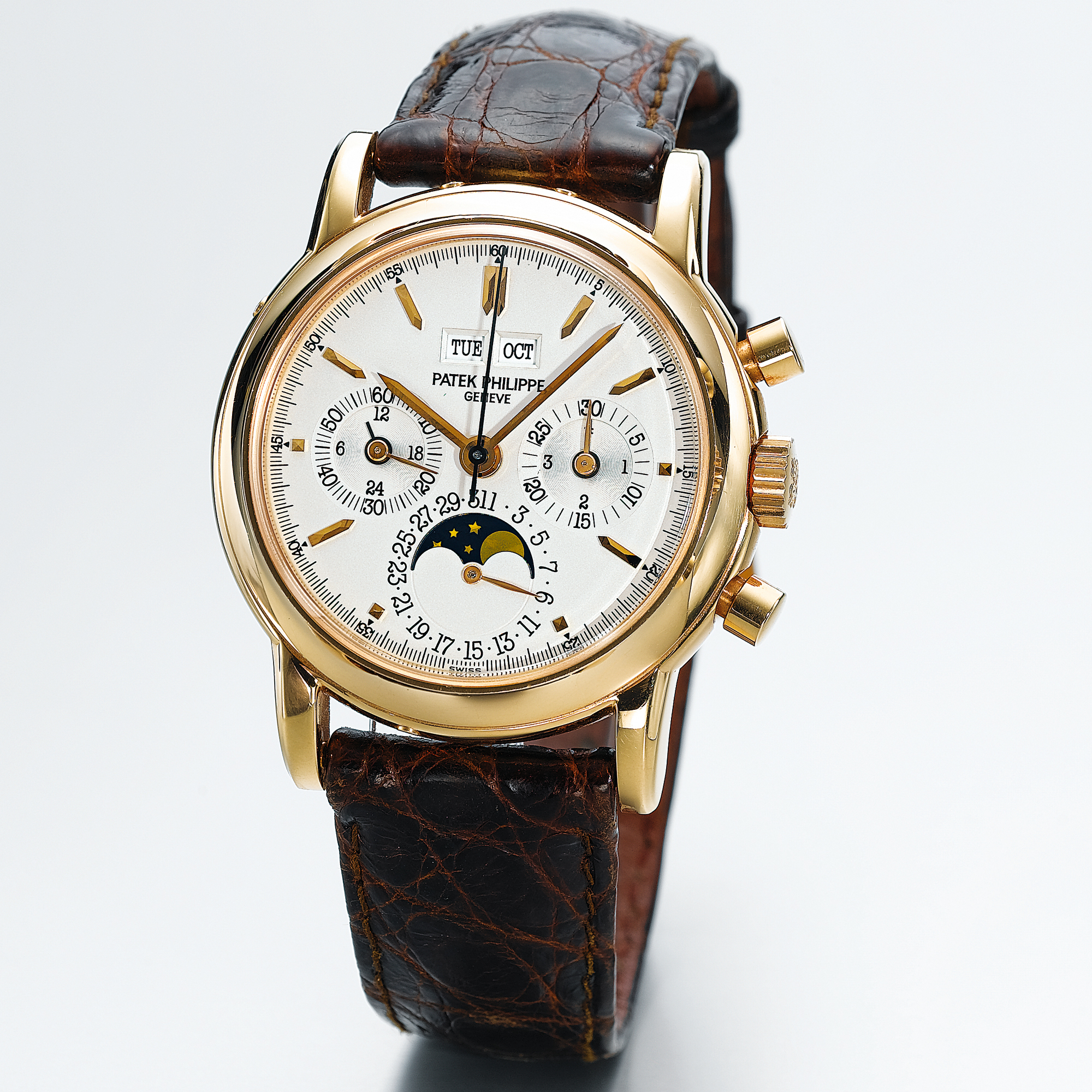 PATEK PHILIPPE, A FINE AND RARE GOLD PERPETUAL CALENDAR CHRONOGRAPH WRISTWATCH WITH MOON-PHASES AND REGISTERCIRCA 1995 REF 3970E CASE 2953527